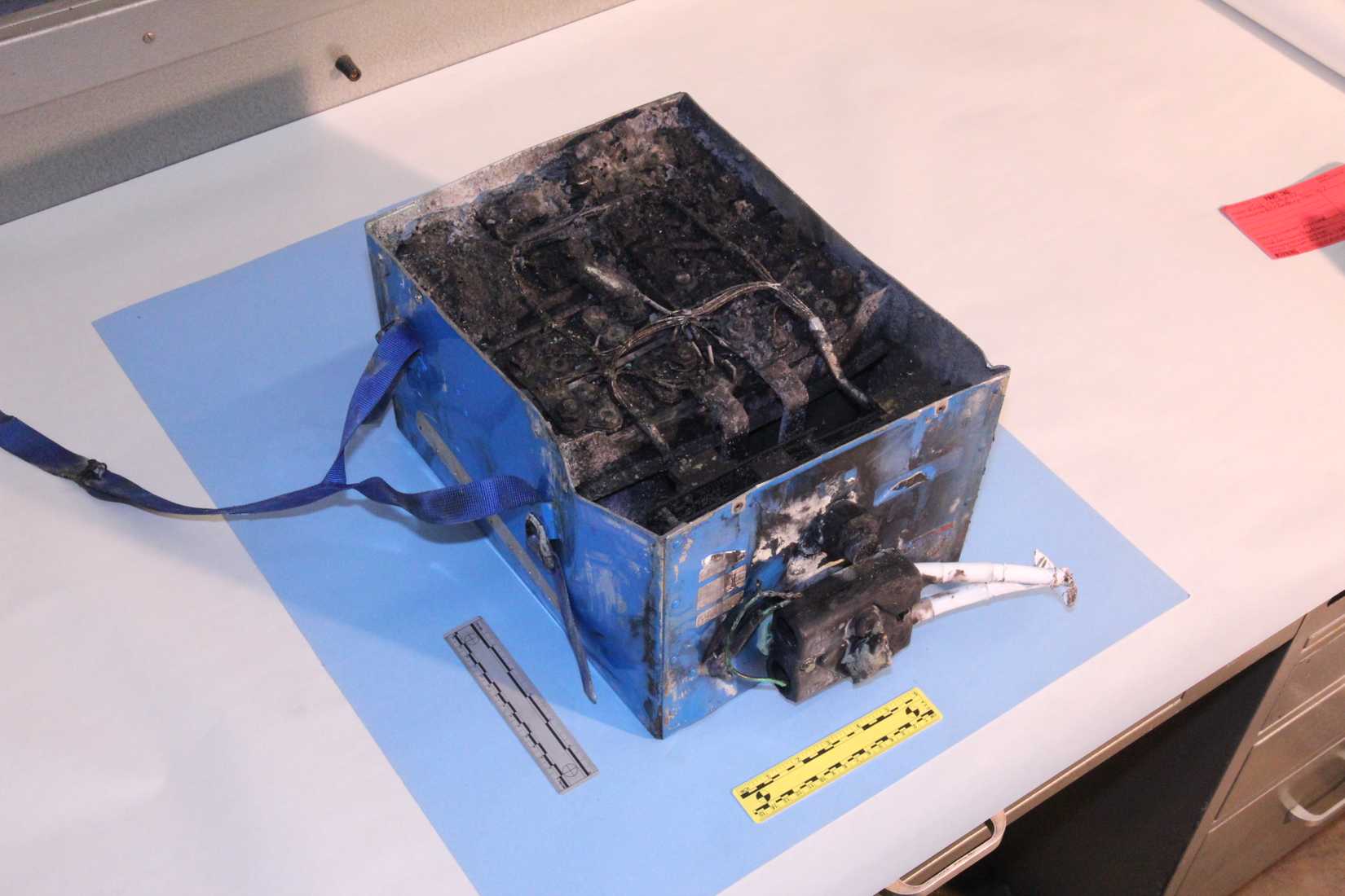 NTSB photos of the burned auxiliary power unit battery from a JAL Boeing 787 that caught fire on Jan. 7 at Boston's Logan International Airport.