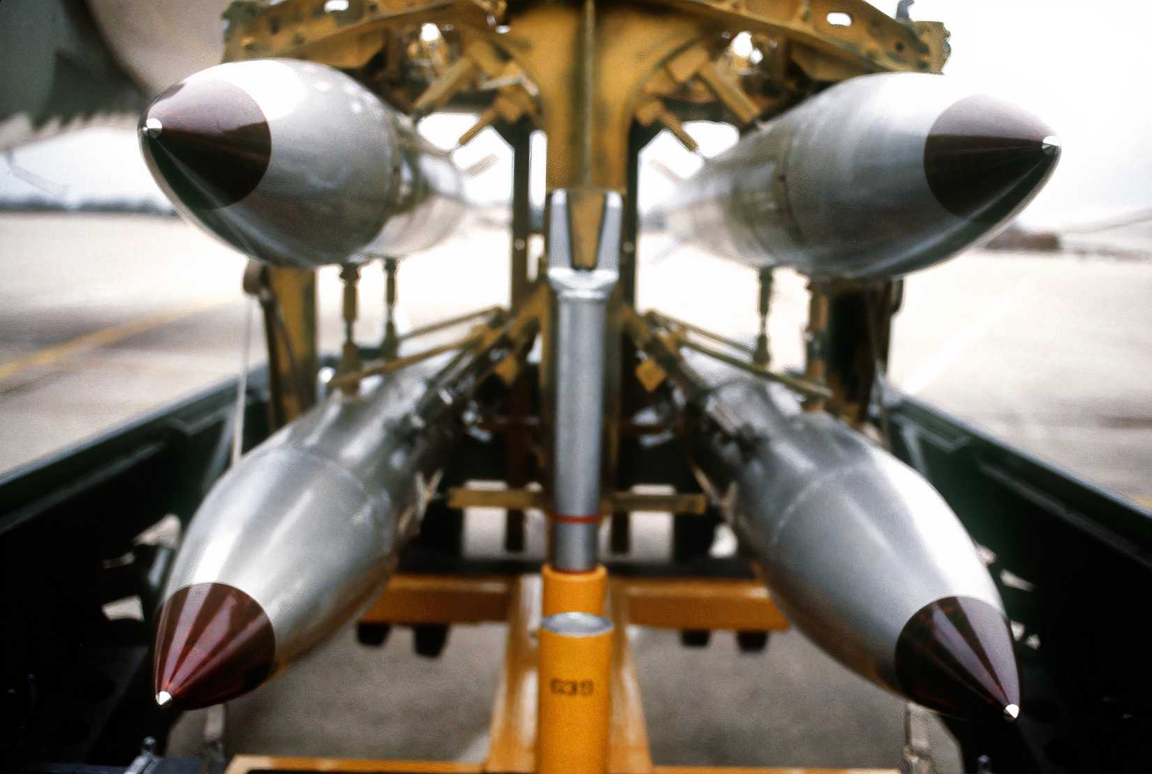 Nuclear gravity bombs attached to its loading rack, presumably below a B-52.  