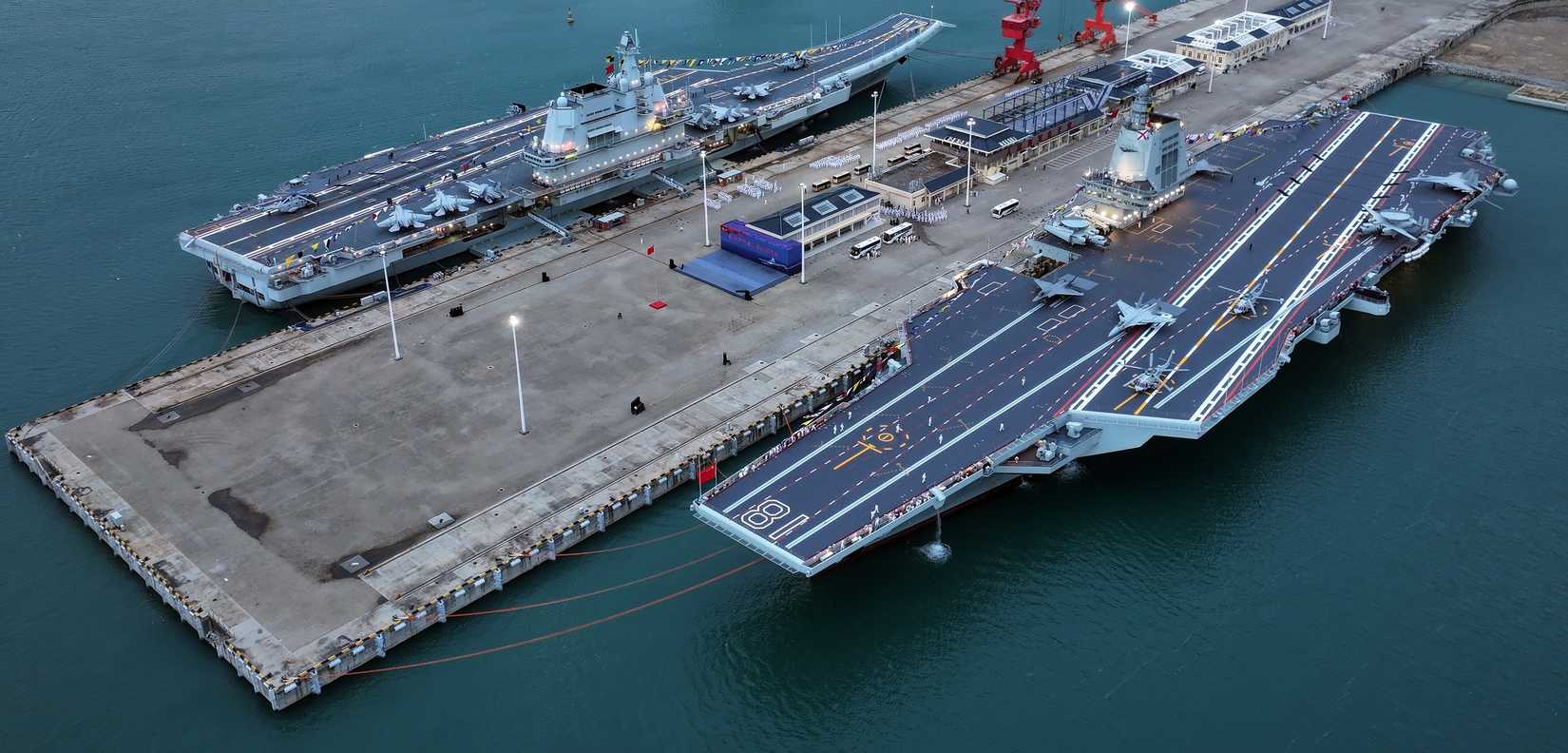 Photo shows aircraft carrier Shandong (Hull 17) and Fujian (Hull 18) attached to the navy of the Chinese PLA Southern Theater Command.