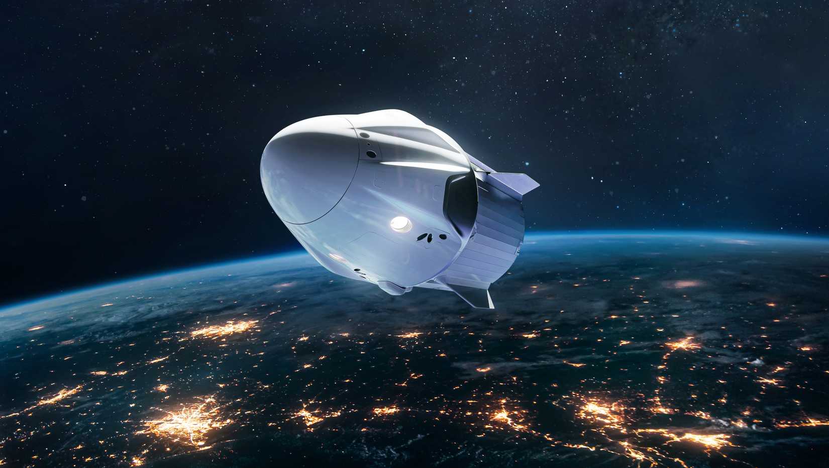 Spacecraft on orbit of Earth. Spaceship in outer space. Future and commercial tourism. Earth at night. Elements of this image furnished by NASA