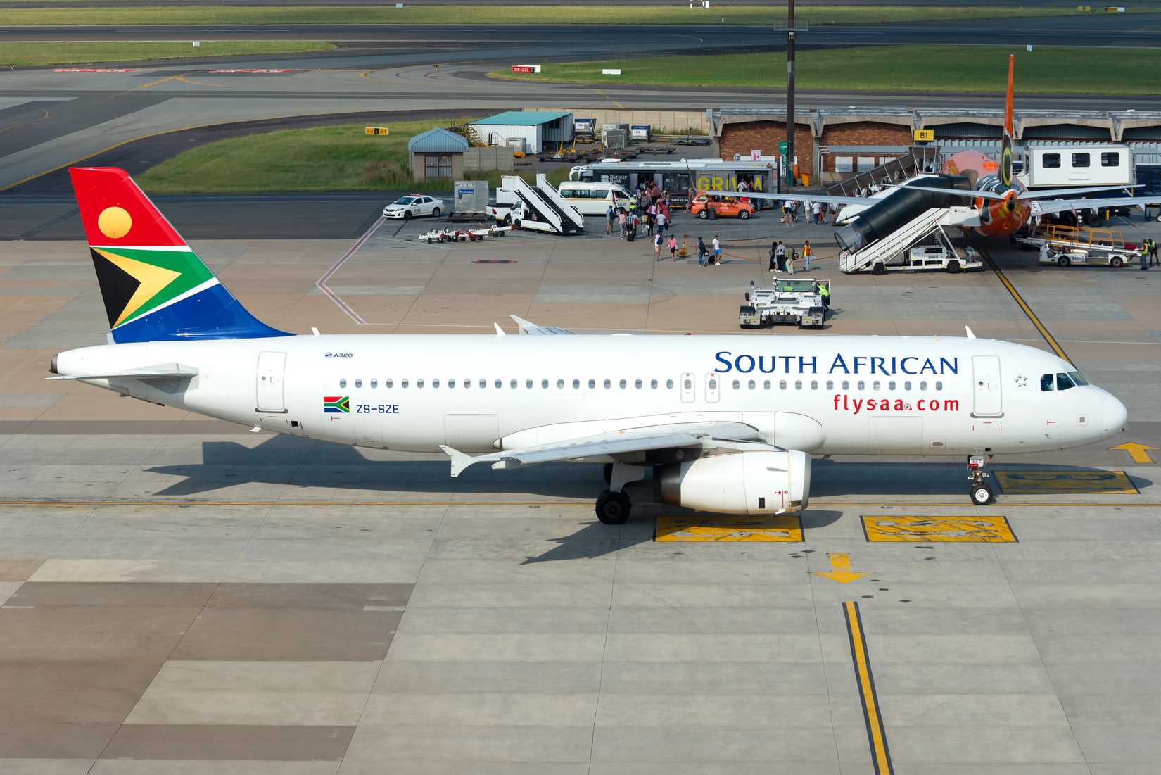 South African Airways Airbus A320 parked on apron