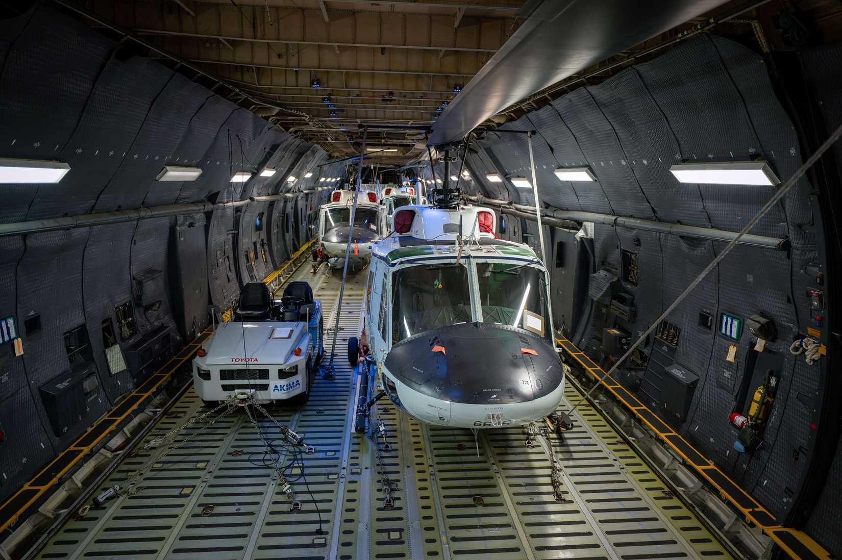 Three UH-1N Huey’s are loaded into a C-5M Super Galaxy assigned to the 22nd Airlift Squadron at Yokota Air Base, Japan, Dec. 3, 2025.
