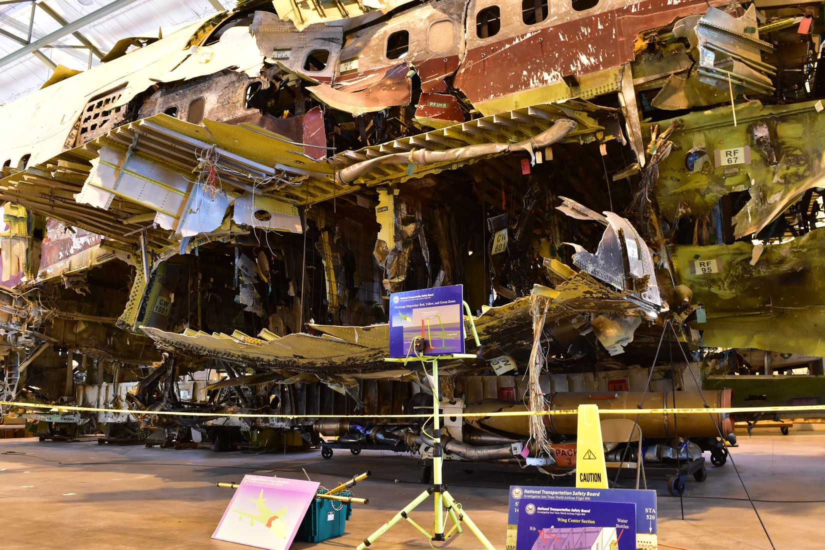Reconstruction of TWA Flight 800 Boeing 747 wreckage in an NTSB hangar for forensic training