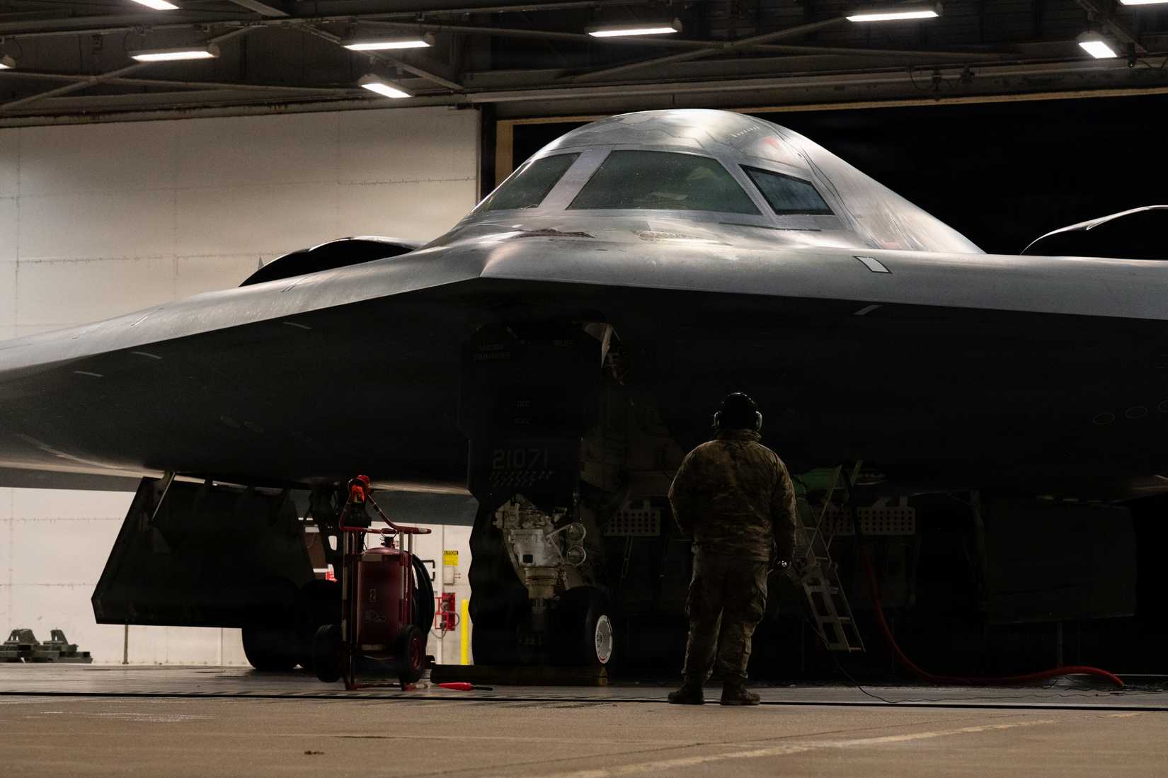 U.S. Air Force crew chiefs perform pre-flight checks on a B-2 Spirit stealth bomber during Operation Epic Fury, March 17, 2026.