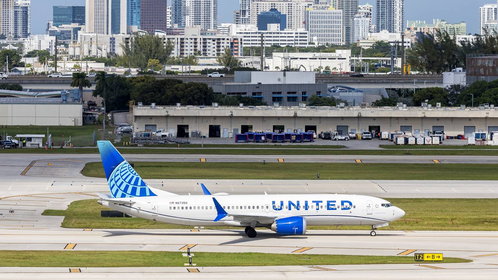 United Airlines Flight Diverts After Passenger Tries To Open Door & Attacks Another Traveler