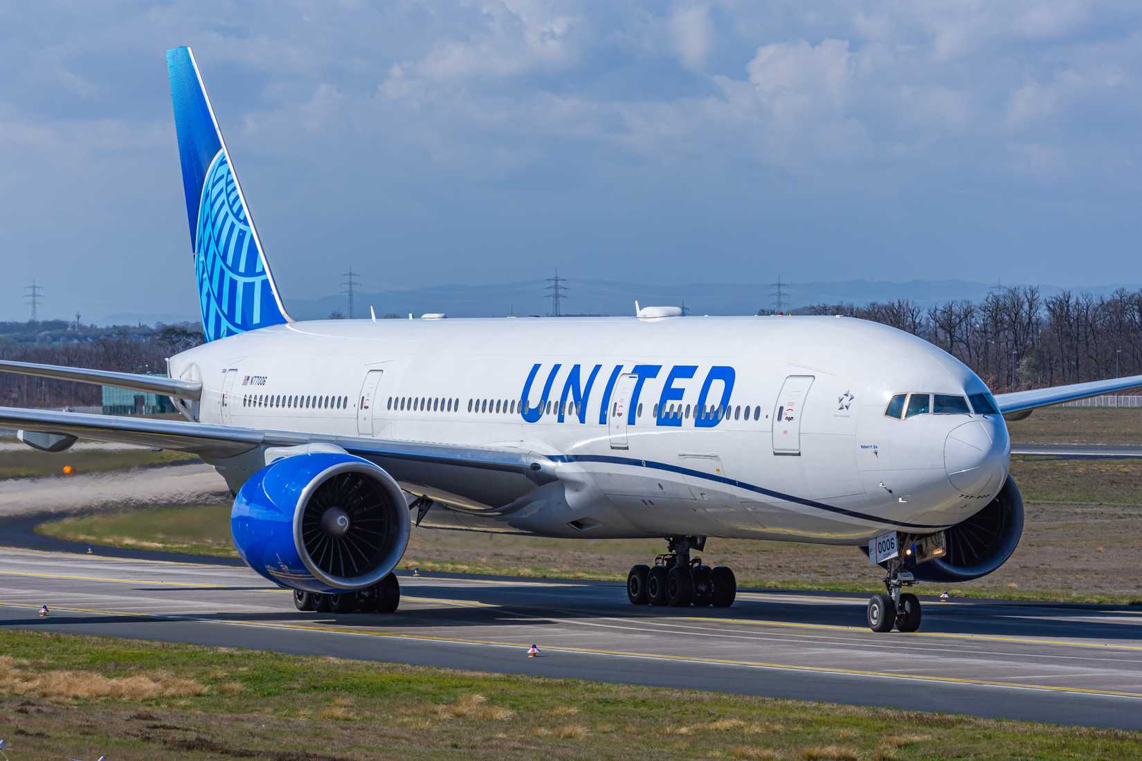 United Airlines Boeing 777-200ER is heading to its gate after landing at Frankfurt International Airport.