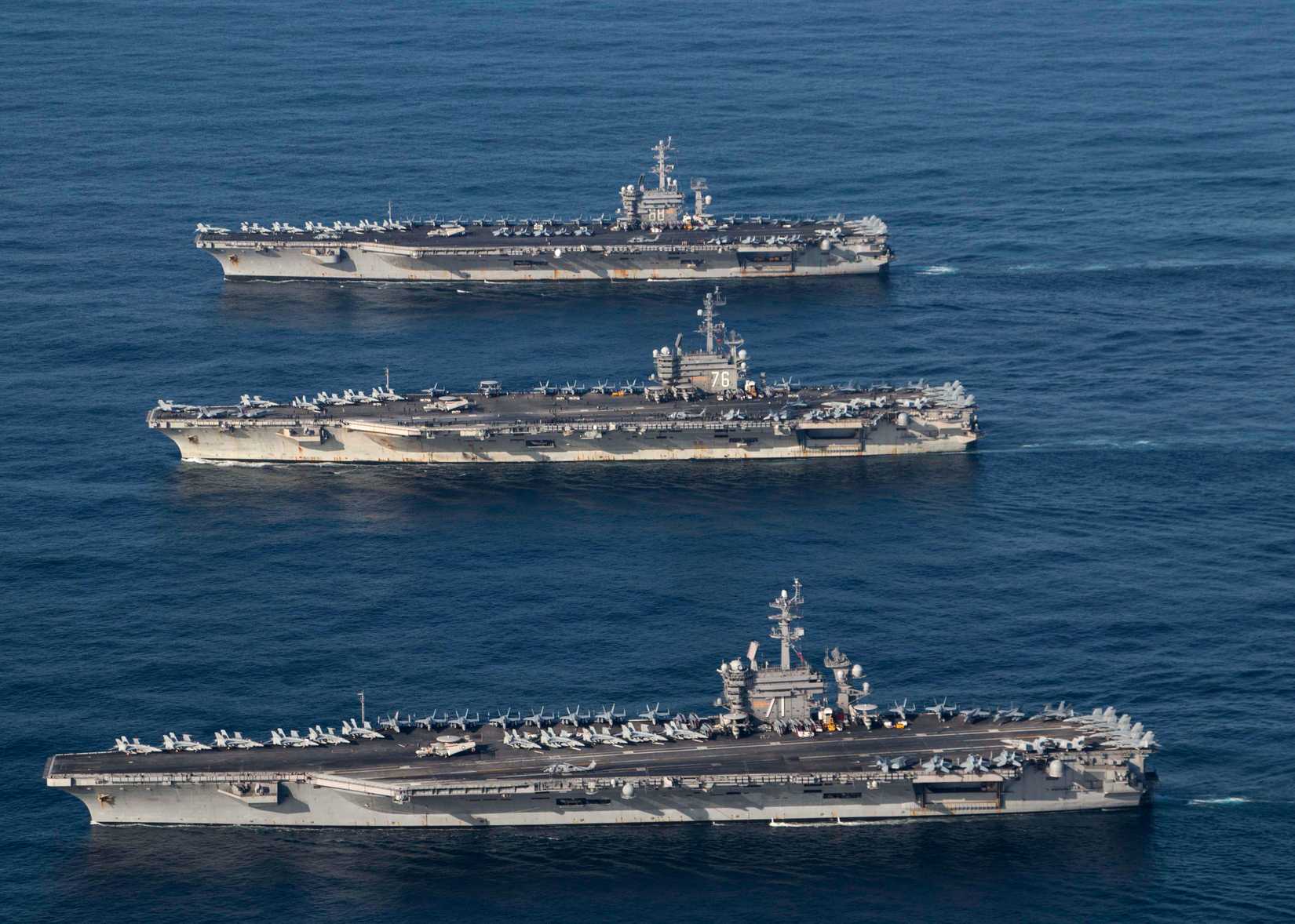  The U.S. Navy aircraft carriers USS Nimitz (CVN-68), USS Theodore Roosevelt (CVN-71) and USS Ronald Reagan (CVN-76) underway in the Western Pacific on 12 November 2017. The strike groups were underway and conducting operations in international waters as part of a three-carrier strike force exercise. This was the first time since August 2007 that three U.S. Navy carriers operated together. In 2007, USS Kitty Hawk (CV-63), USS Nimitz (CVN-68) and USS John C. Stennis (CVN-74) participated in exerc