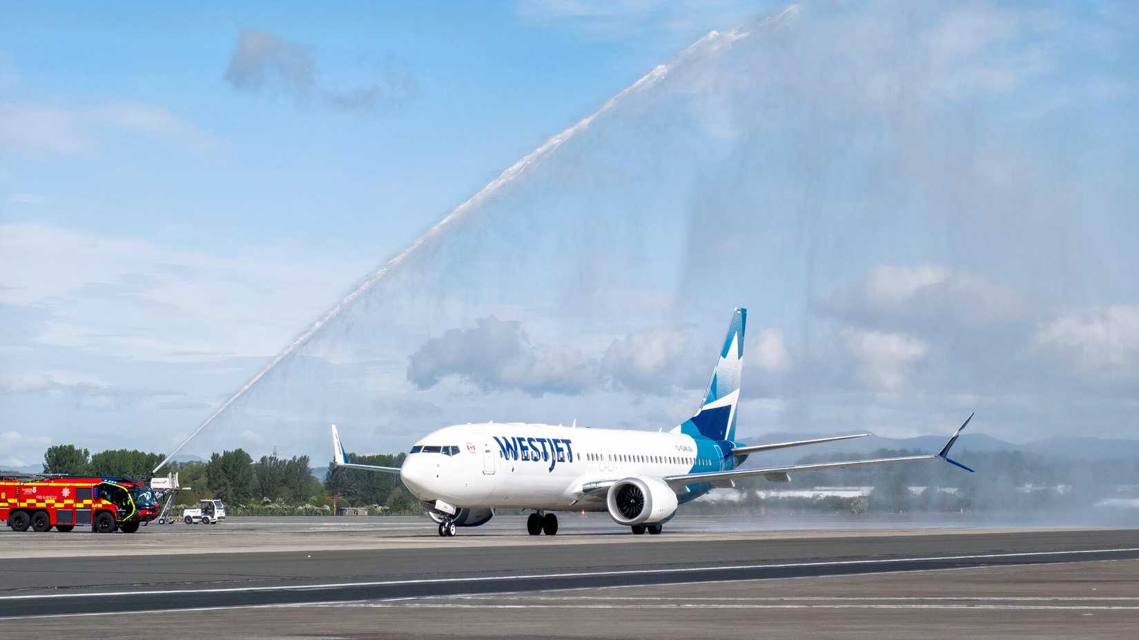WestJet Toronto to Glasgow return water arch-1
