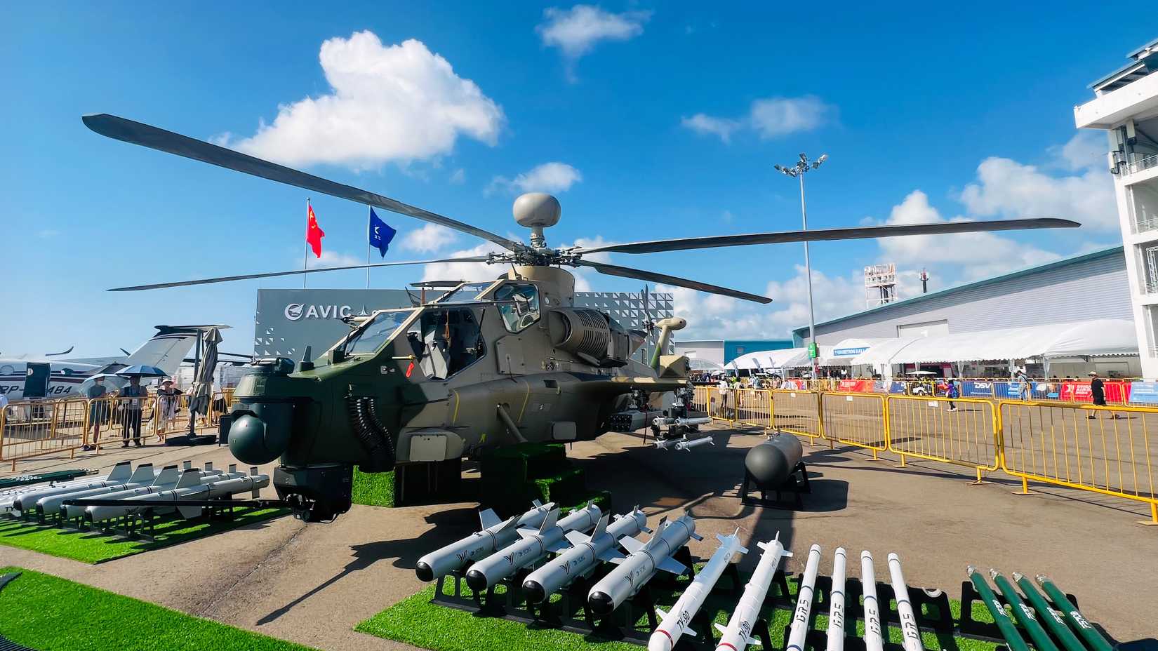 A Z-10 attack helicopter sits as an exhibit at what appears to be an airshow