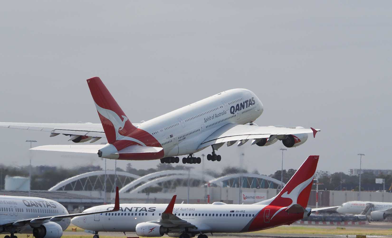 Qantas Airbus A380 VH-OQI and two Qantas Boeing 737 VH-VYZ
