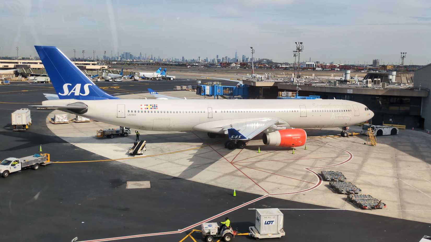 a SAS Scandinavian Airlines Airbus A330-300 jet airliner arriving for landing at New York JFK and Newark (EWR) International Airport.