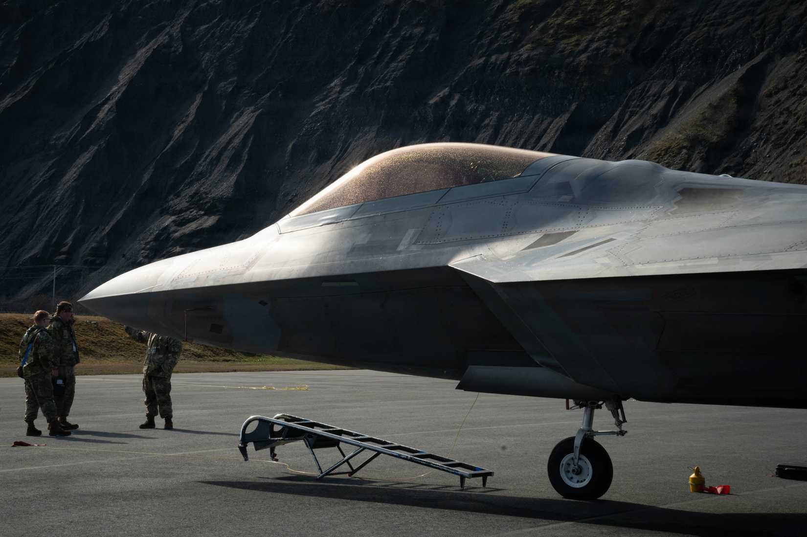 A U.S. Air Force F-22 Raptor aircraft assigned to the 3rd Wing stands by for post-flight checks and maintenance during exercise Tropic Tundra 26.-1
