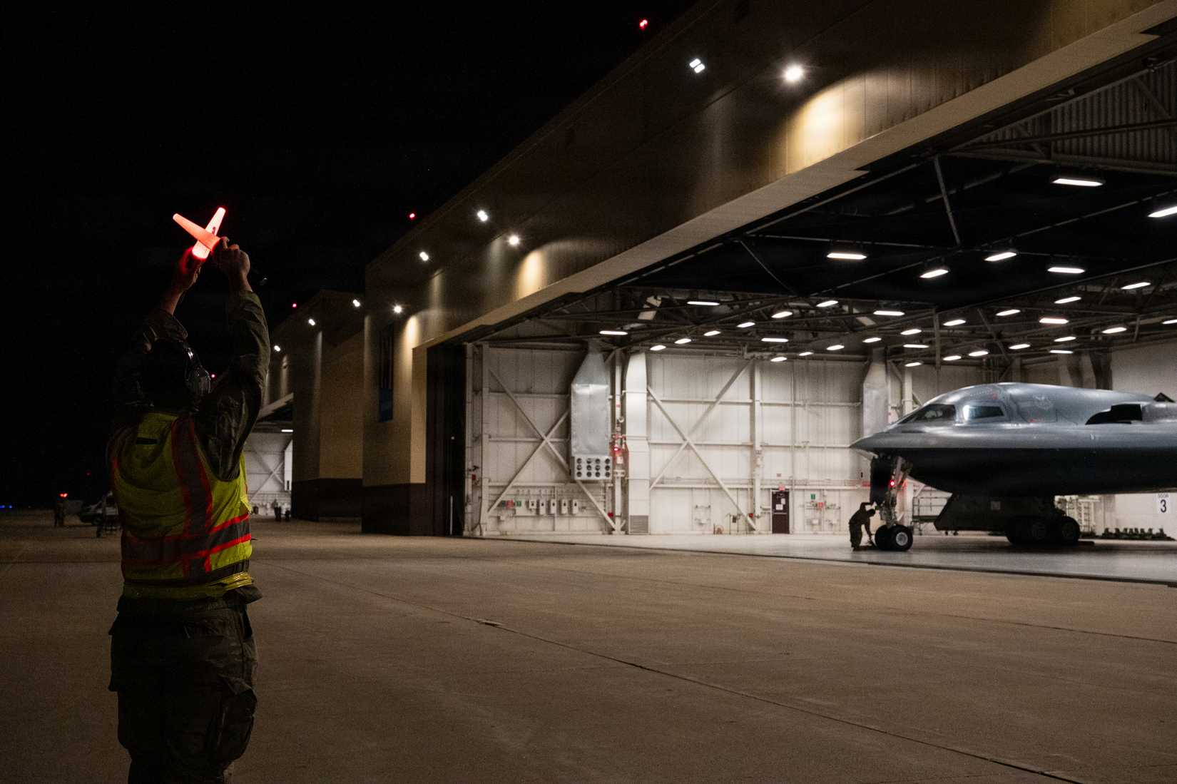 Airmen conduct preflight operations prior to a B-2 Spirit stealth bomber departing base in the U.S. Strategic Command area of responsibility in support of Operation Epic Fury, March 29, 2026.