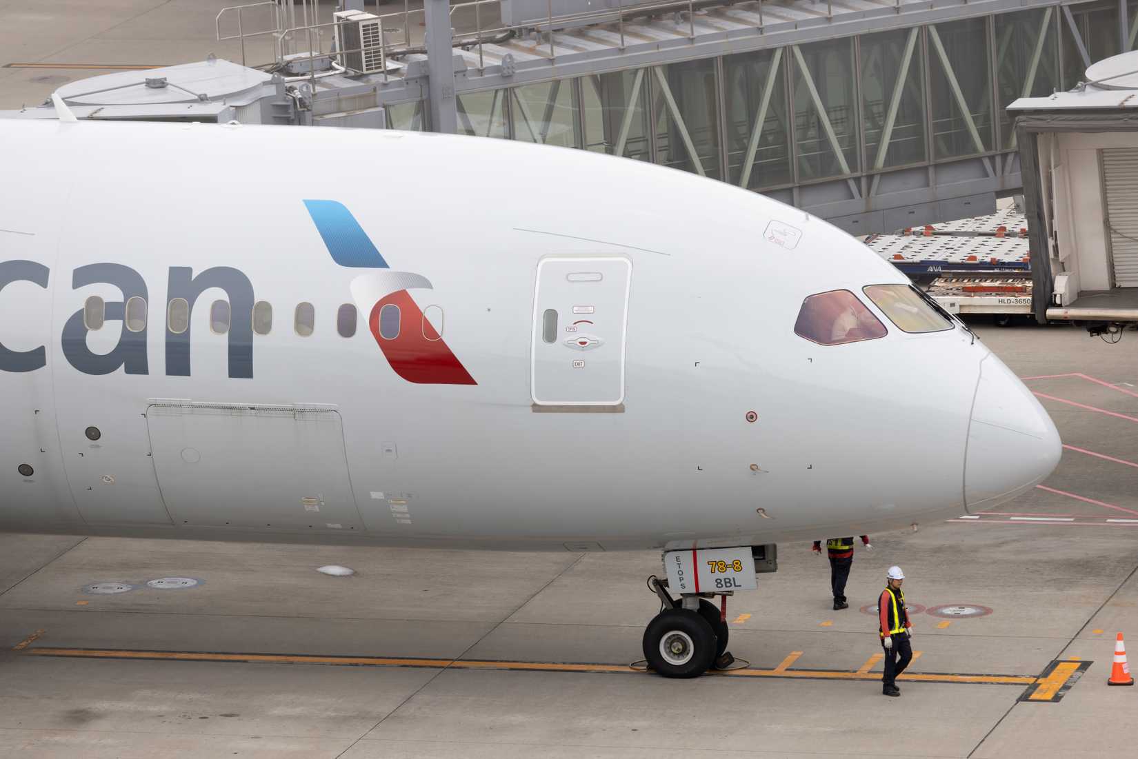 American Airlines waiting at gate at Tokyo Haneda International Airport