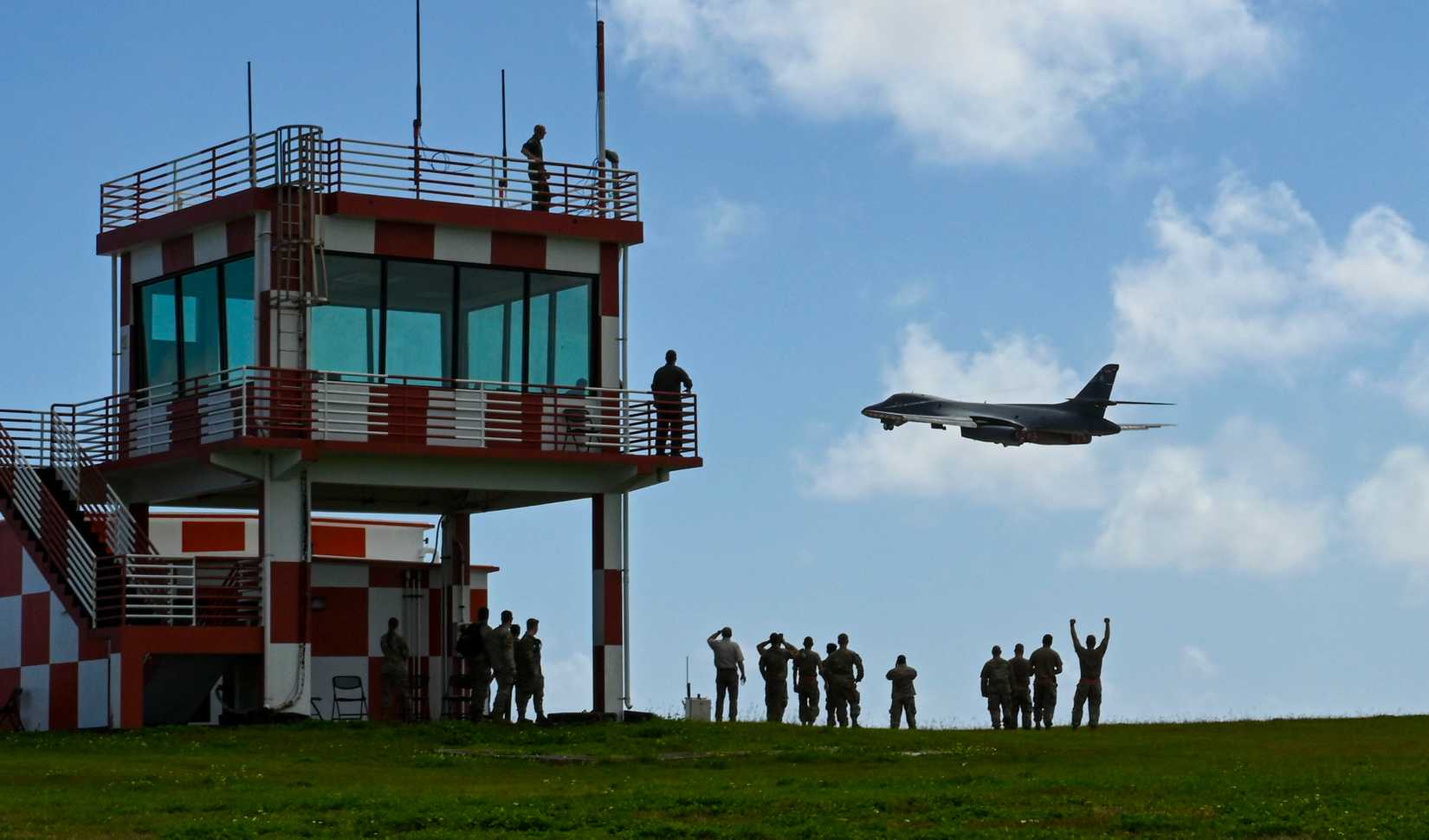 B-1B Lancer assigned to the 34th Expeditionary Bomb Squadron, Ellsworth Air Force Base, S.D., takes off as aircrew and maintainers watch.