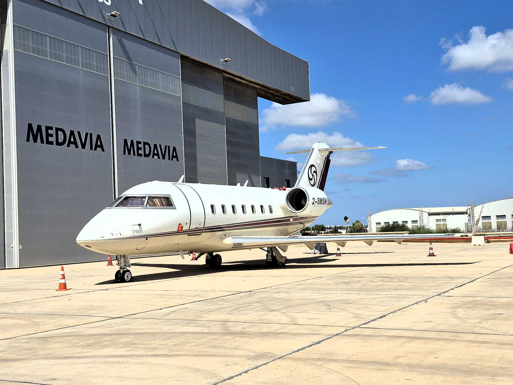 Bombardier Challenger 600 charter jet parked at Malta International Airport