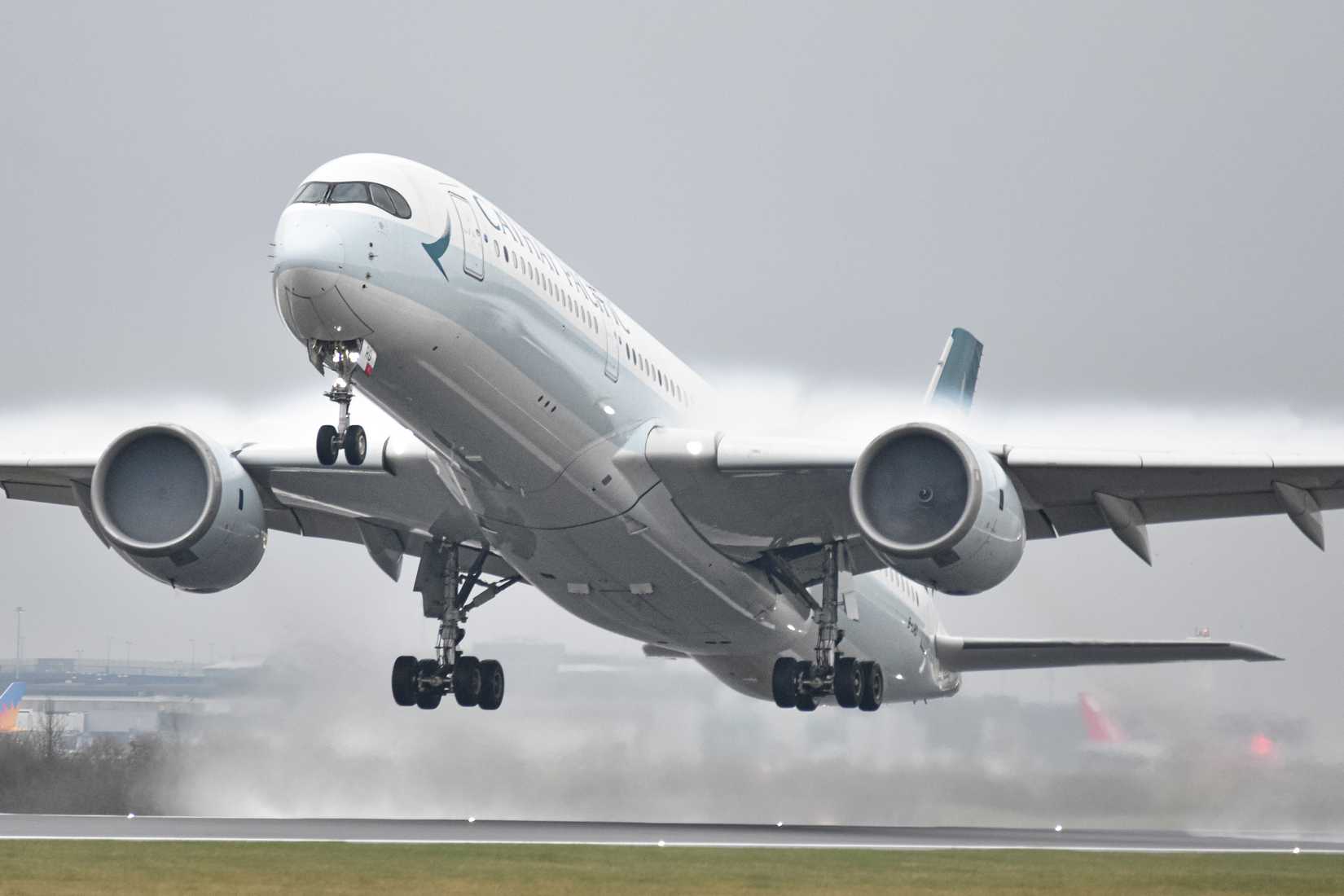 Cathay Pacific A350-900 B-LRD departing Manchester Airport.