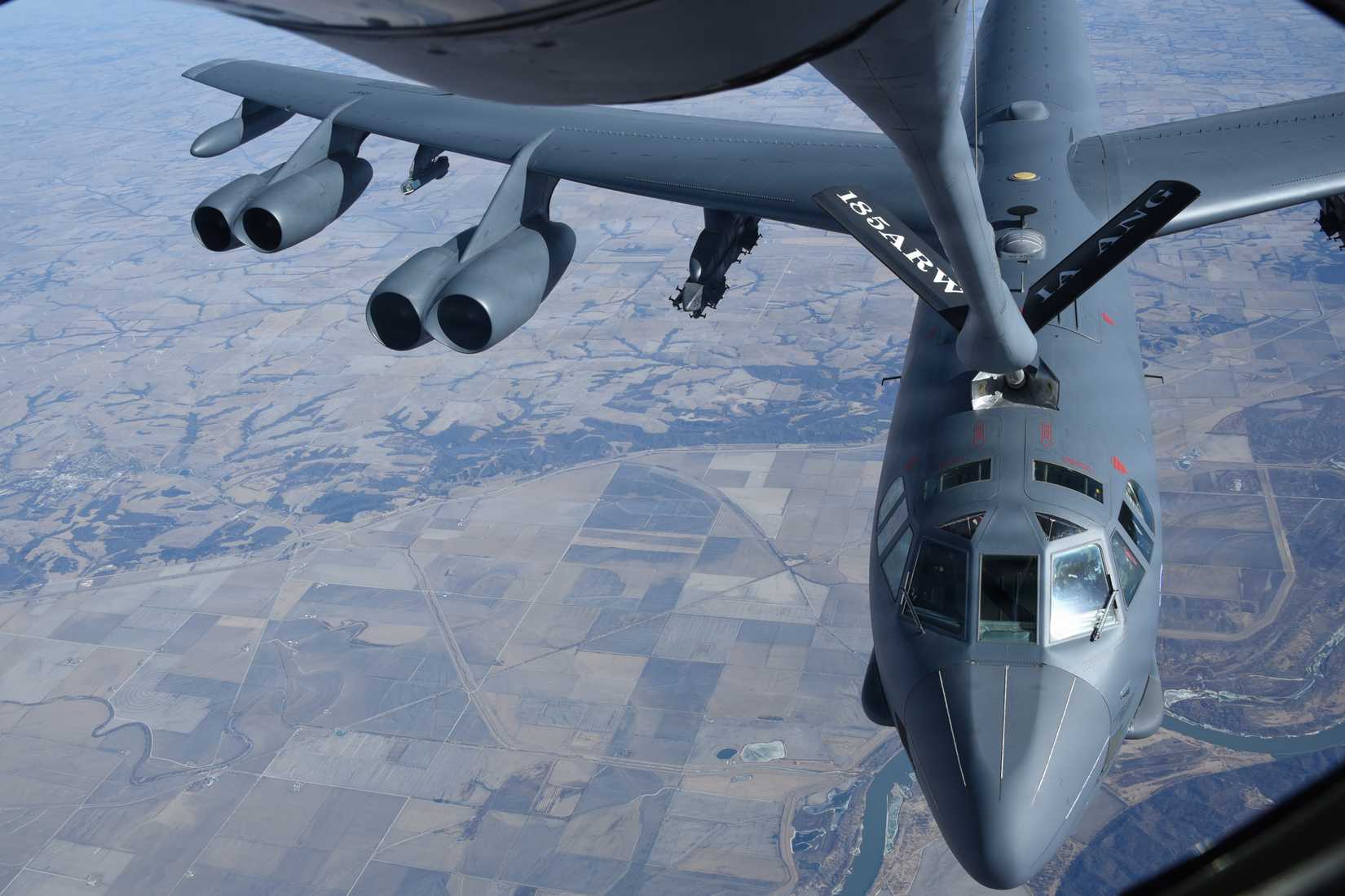 Air Force B-52H Stratofortress assigned to the 5th Bomb Wing of Minot Air Force Base receives fuel from a U.S. Air Force KC-135 Stratotanker