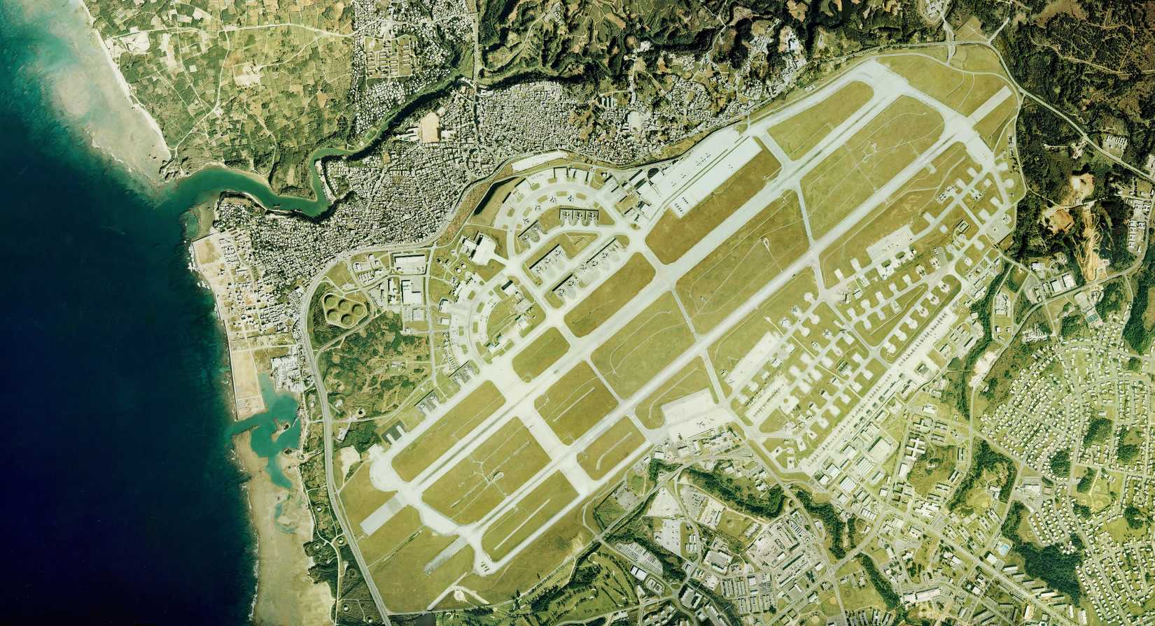 An aerial photograph of Kadena Air Base, displaying its massive size. 