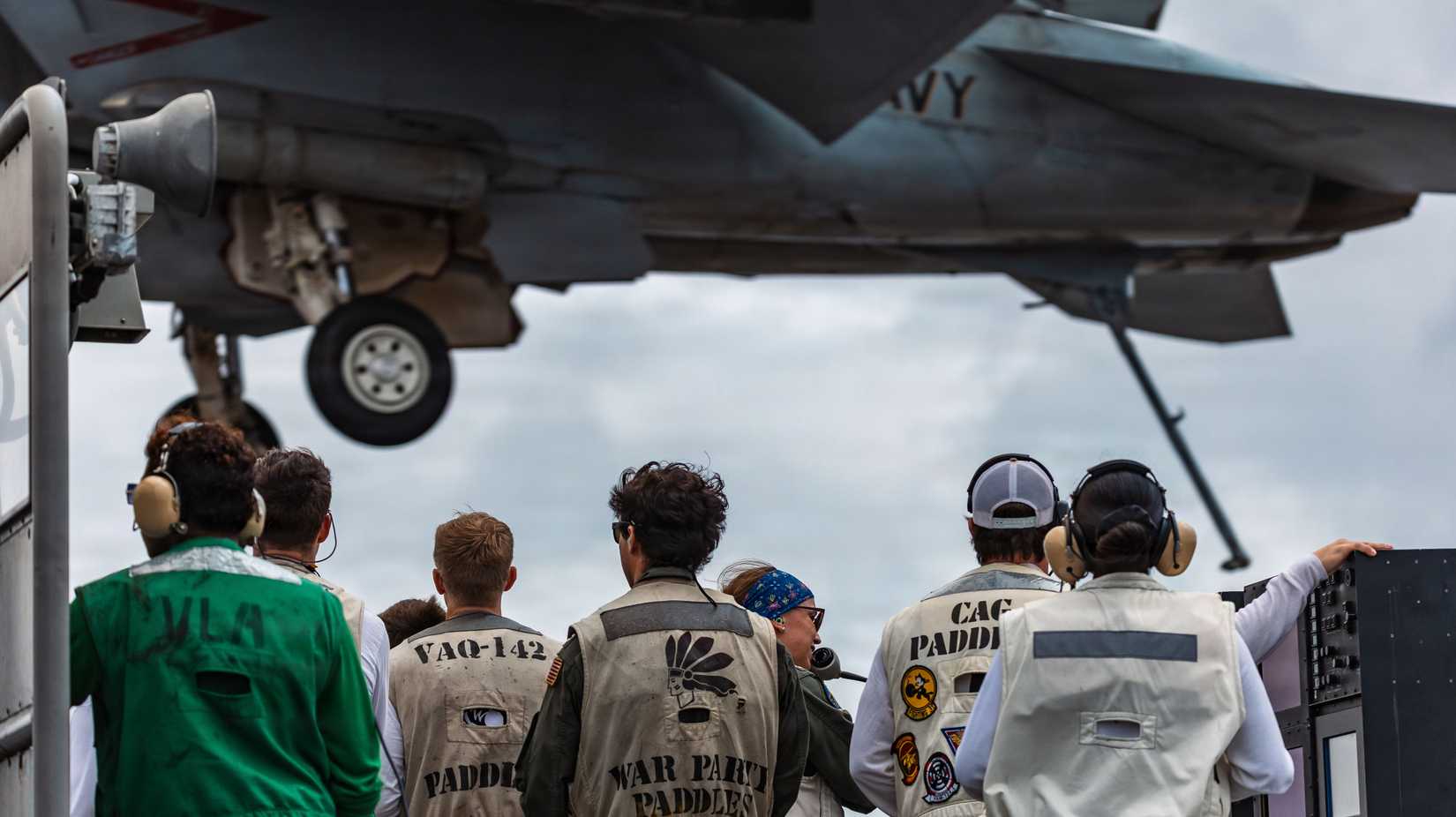 Landing Signals Officers watch an arrested landing on USS Gerald R. Ford (CVN 78)