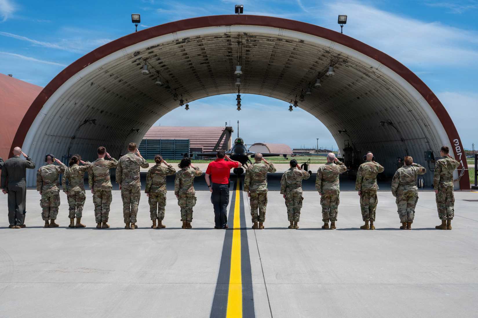 Leadership from the 8th Fighter Wing salute U.S. Air Force Col. Kathryn “Wolf” Gaetke, Wing commander, as she parks after her final flight at Kunsan Air Base, Republic of Korea, June 5, 2026.