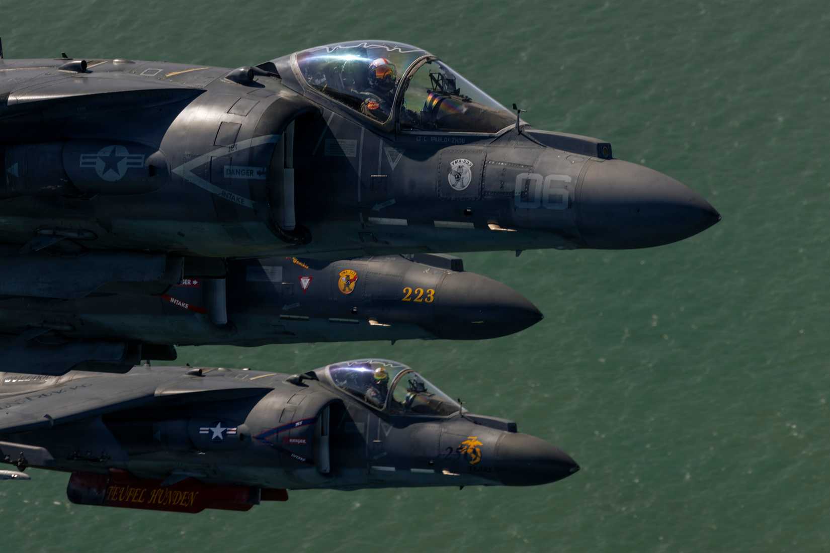 Marine Corps AV-8B Harrier II aircraft with Marine Attack Squadron (VMA) 223, Marine Aircraft Group 14, 2nd Marine Aircraft Wing, fly near the coast of North Carolina.