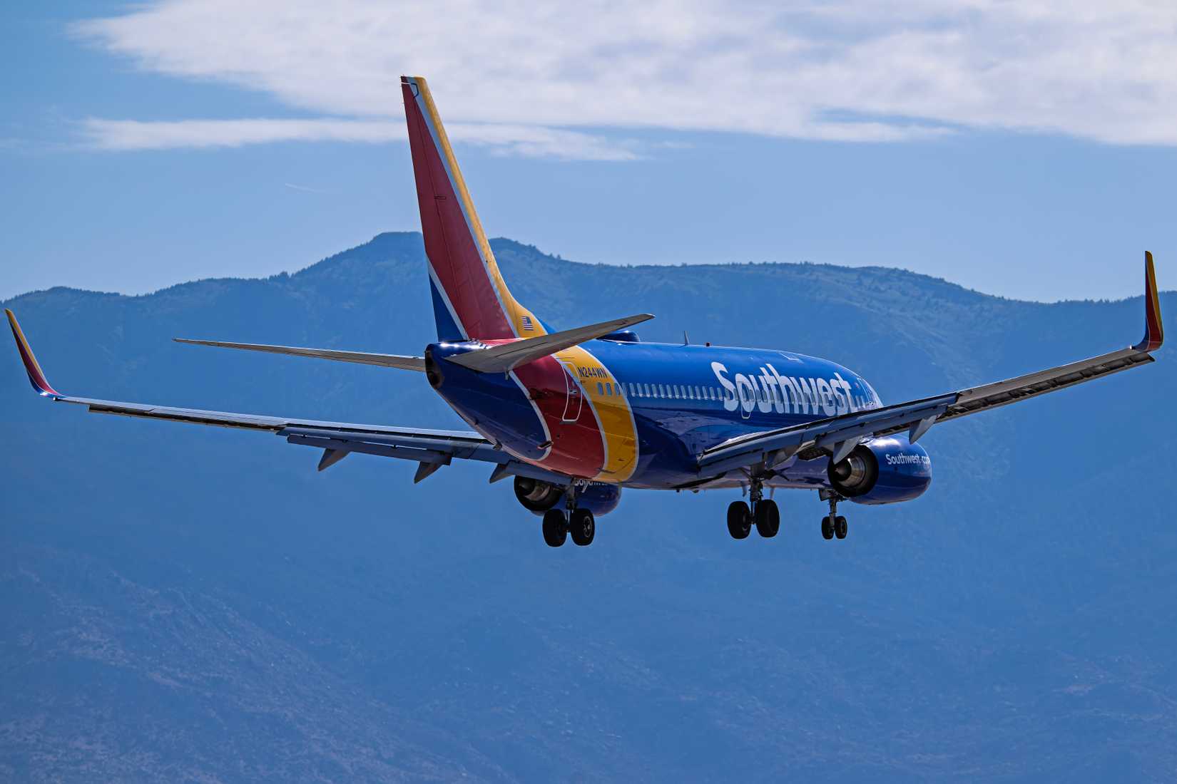 outhwest Airlines Boeing 737-700 N244WN on final for runway 8 at Albuquerque Sunport international airport.