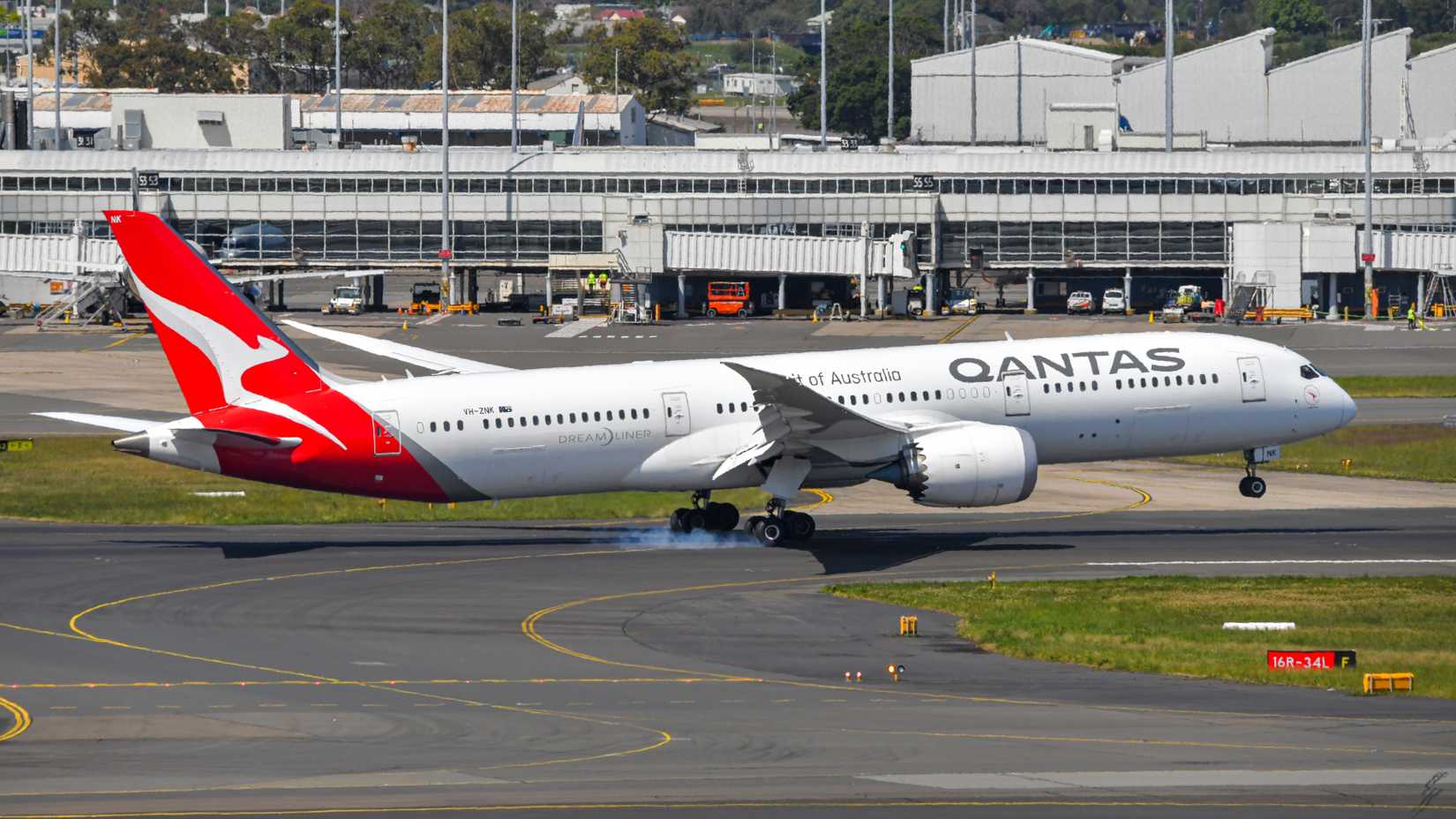 Qantas Boeing 787-9 Dreamliner touching down at Sydney Airport.