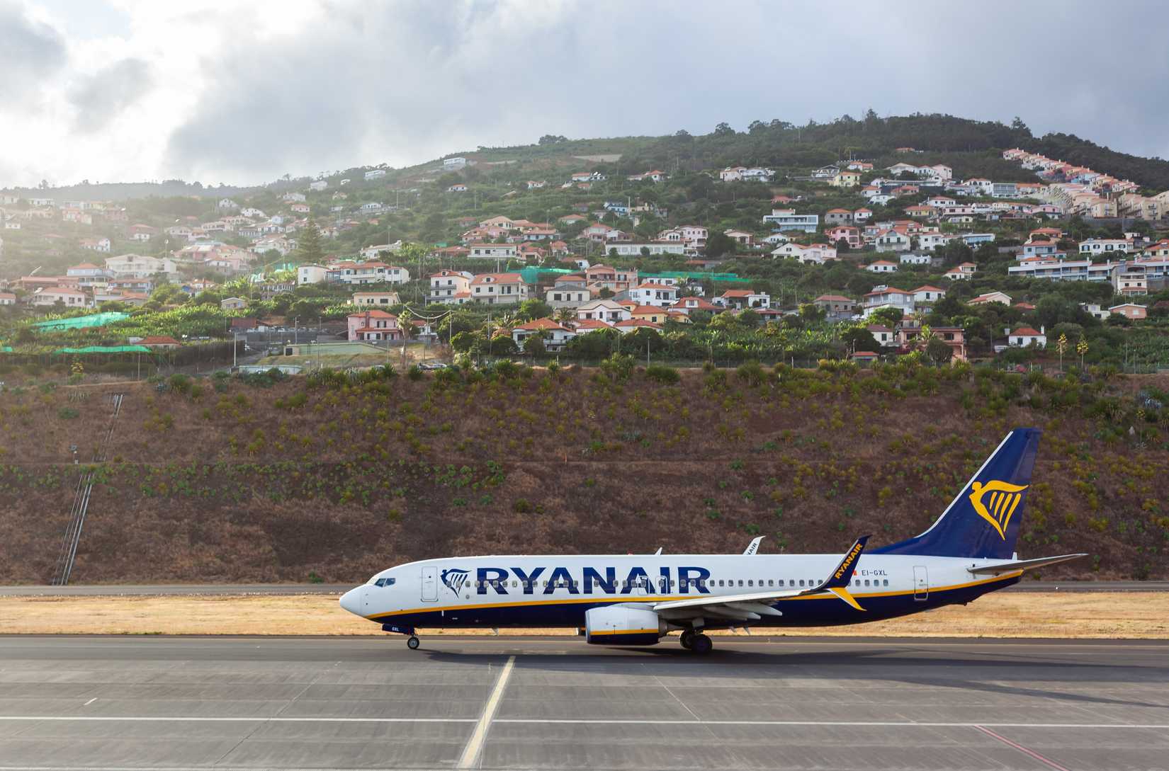 Ryanair airplane on runway at Funchal Airport, Madeira.