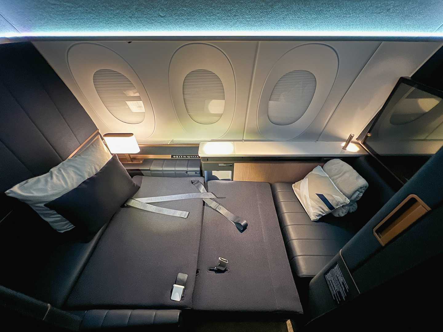 New Lufthansa Allegris First Class outboard fully enclosed Suite cabin with floor to ceiling privacy dividers taken inflight from Charlotte to Munich on 24 April 2025