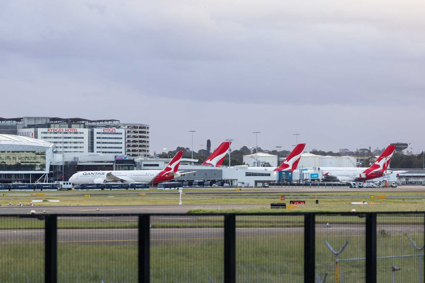 Qantas Aircraft Parked At The Terminal