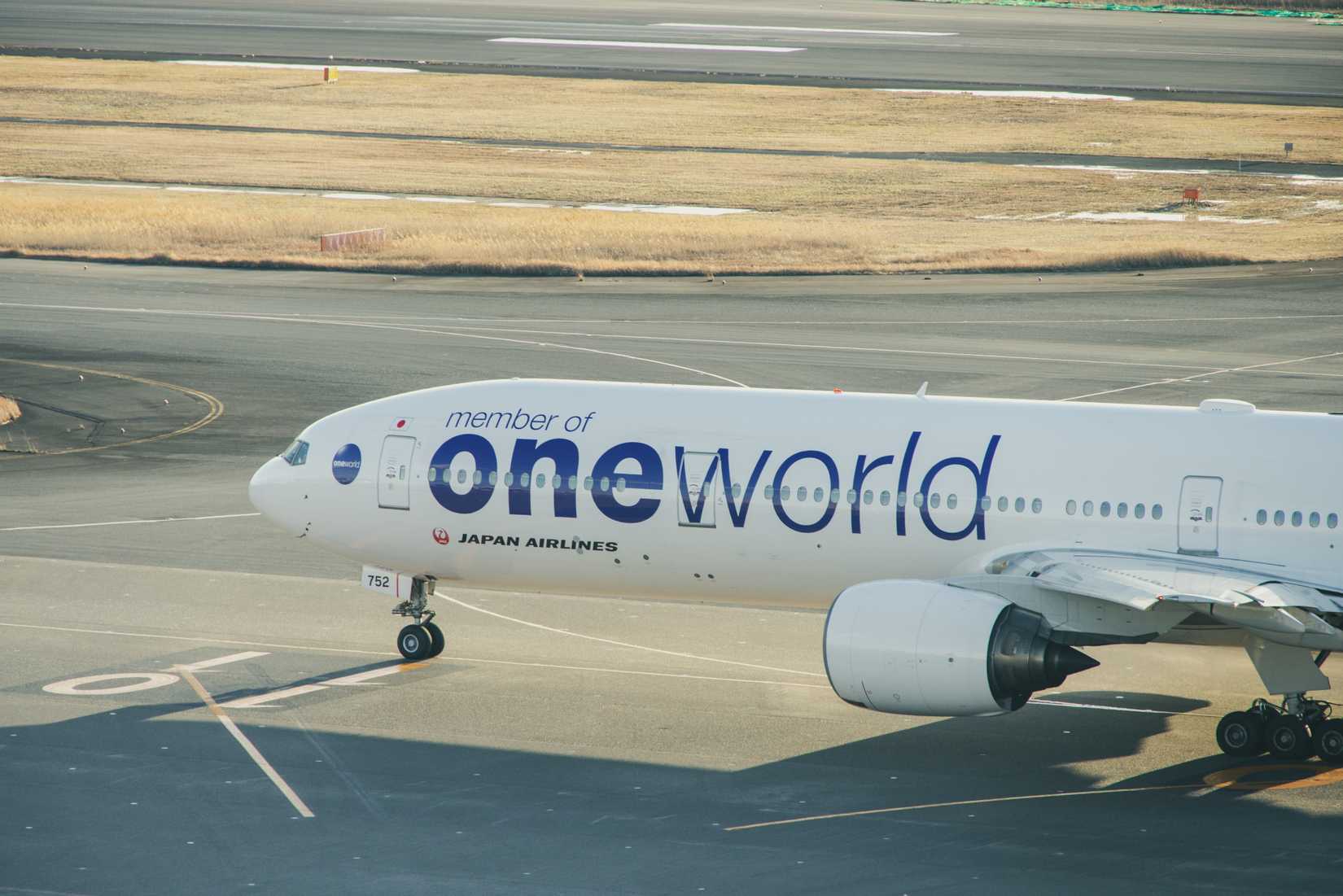 Close up of Japan Airlines Boeing 767 in Oneworld alliance livery taxiing at Haneda Airport