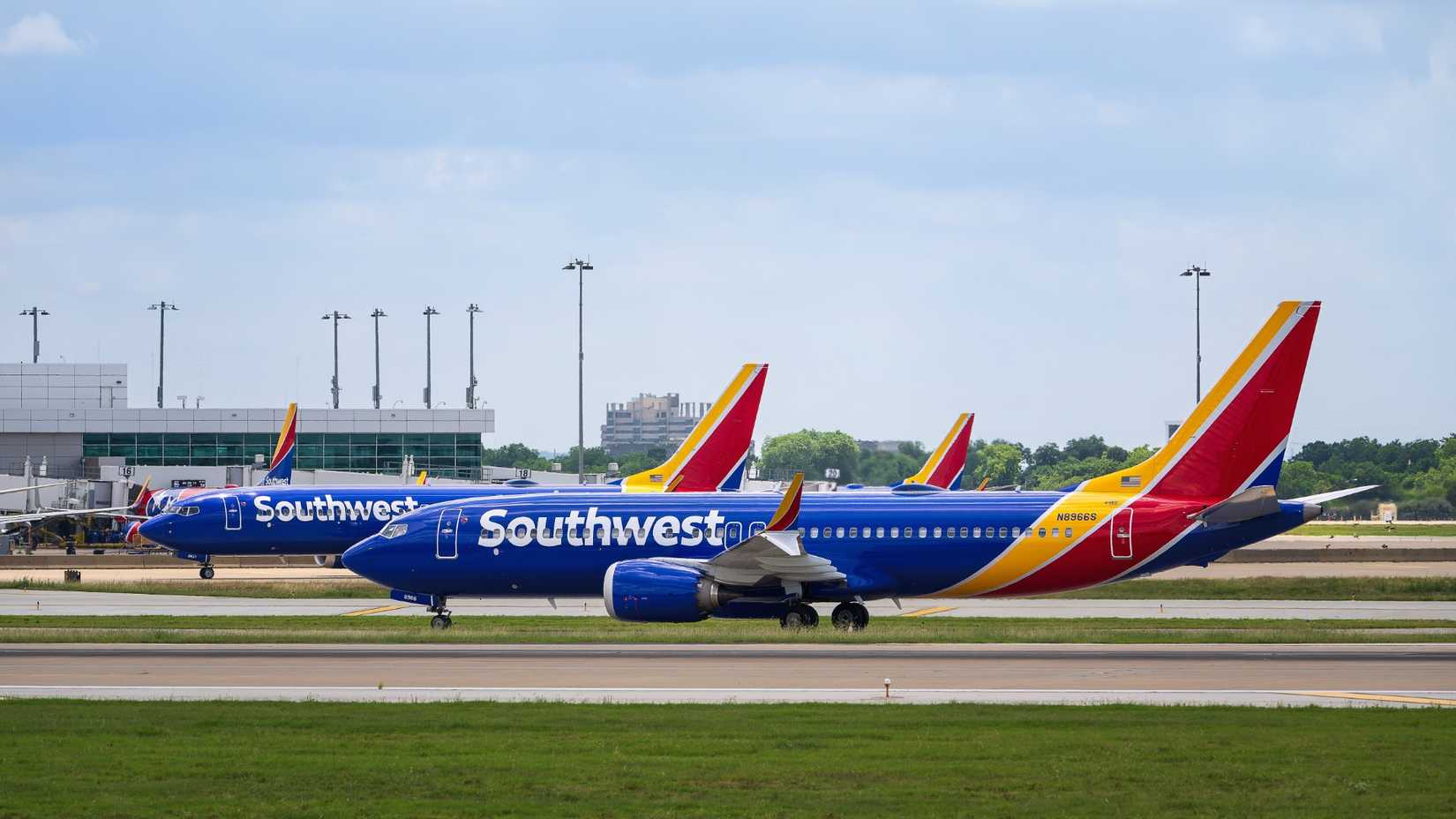 Southwest Airlines aircraft lined up on the runway at the Dallas Love Field Airport (DAL)