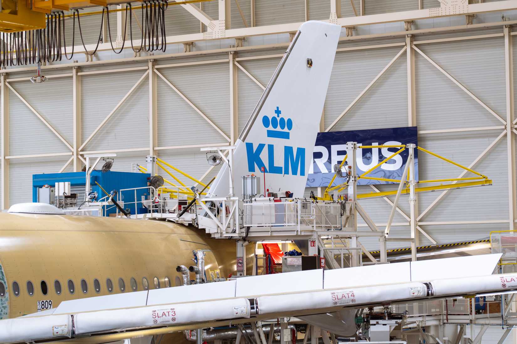 The first KLM A350 has tail livery painted on by Airbus technicians.