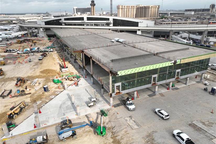 The modules were moved across two closed runways overnight using self-propelled modular transporters in April 2024.