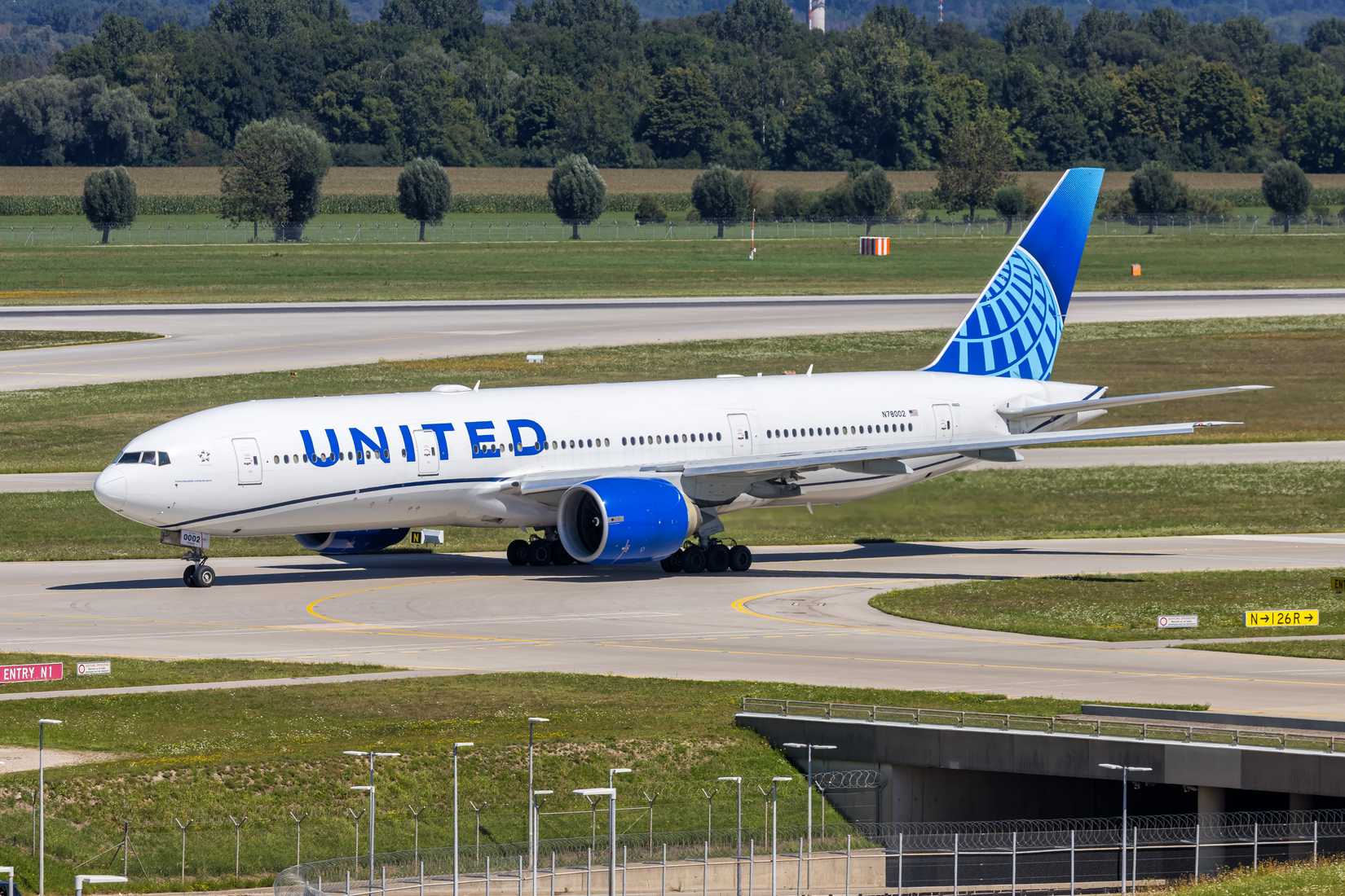 United Airlines Boeing 777-200ER airplane at Munich airport in Germany.