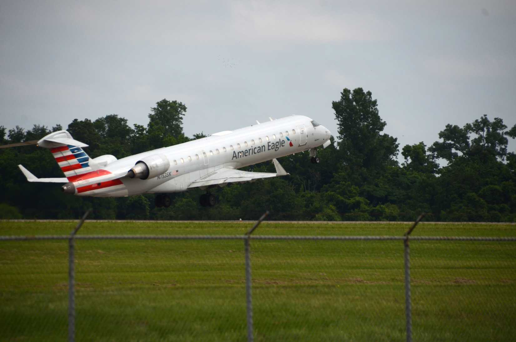 A Bombardier CRJ-700 operated by SkyWest Airlines, taking off from Bill and Hillary Clinton National Airport (LIT) in Little Rock, Arkansas-1