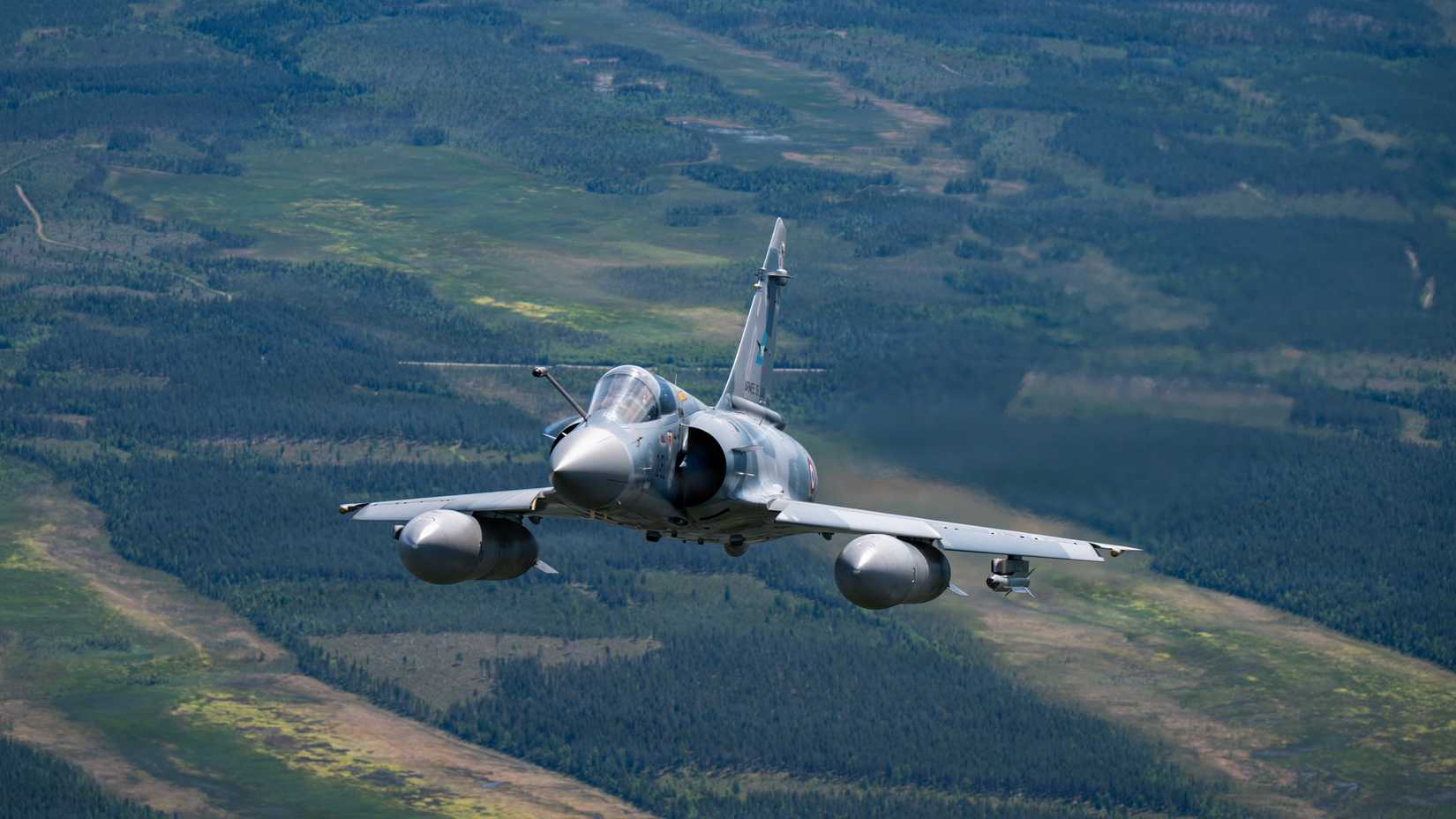 A French Mirage 2000 fighter jet, French Air and Space Force, flies in a square formation alongside NATO Allied aircraft over Finland during exercise Ramstein Flag, June 16, 2026.