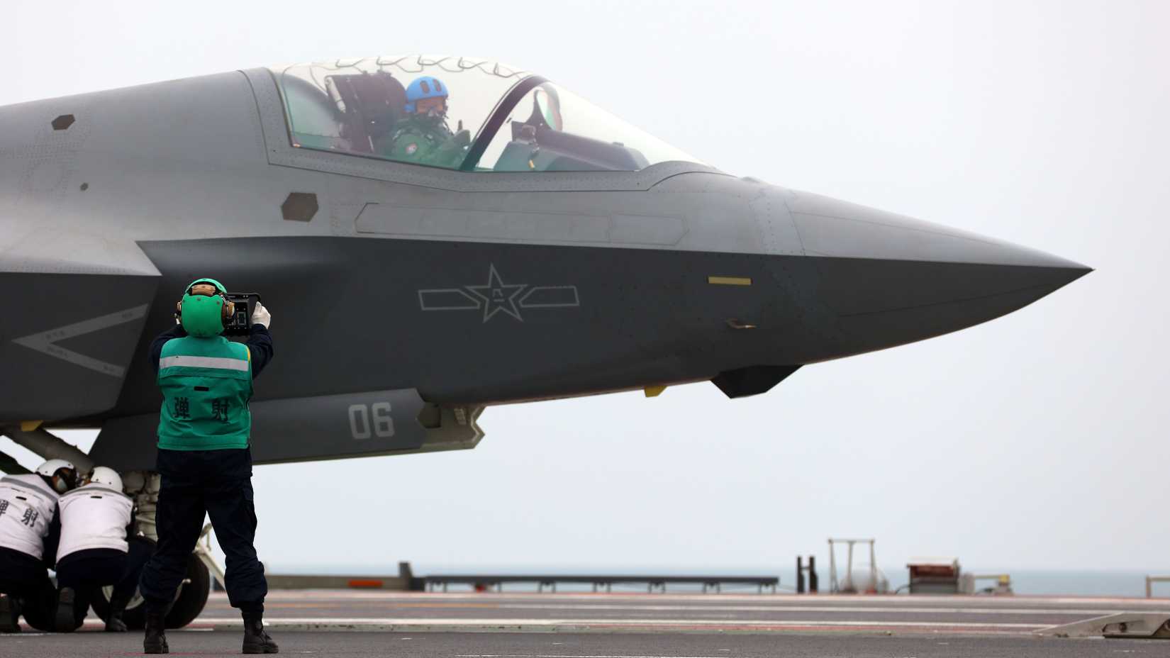 A J-35 stealth fighter jet is ready to take off from China's first electromagnetic catapult-equipped aircraft carrier, the Fujian