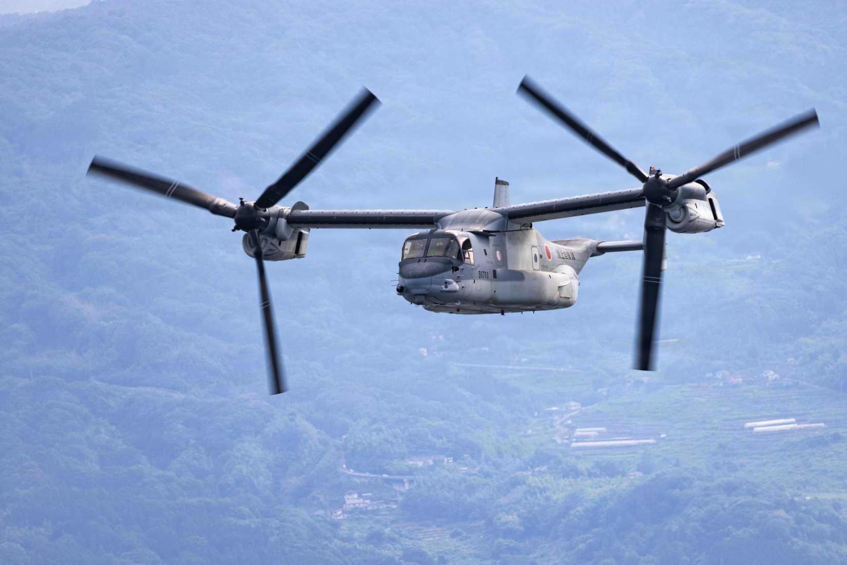 A Japan Ground Self-Defense Force V-22 Osprey tiltrotor aircraft flies over Kumamoto, Japan