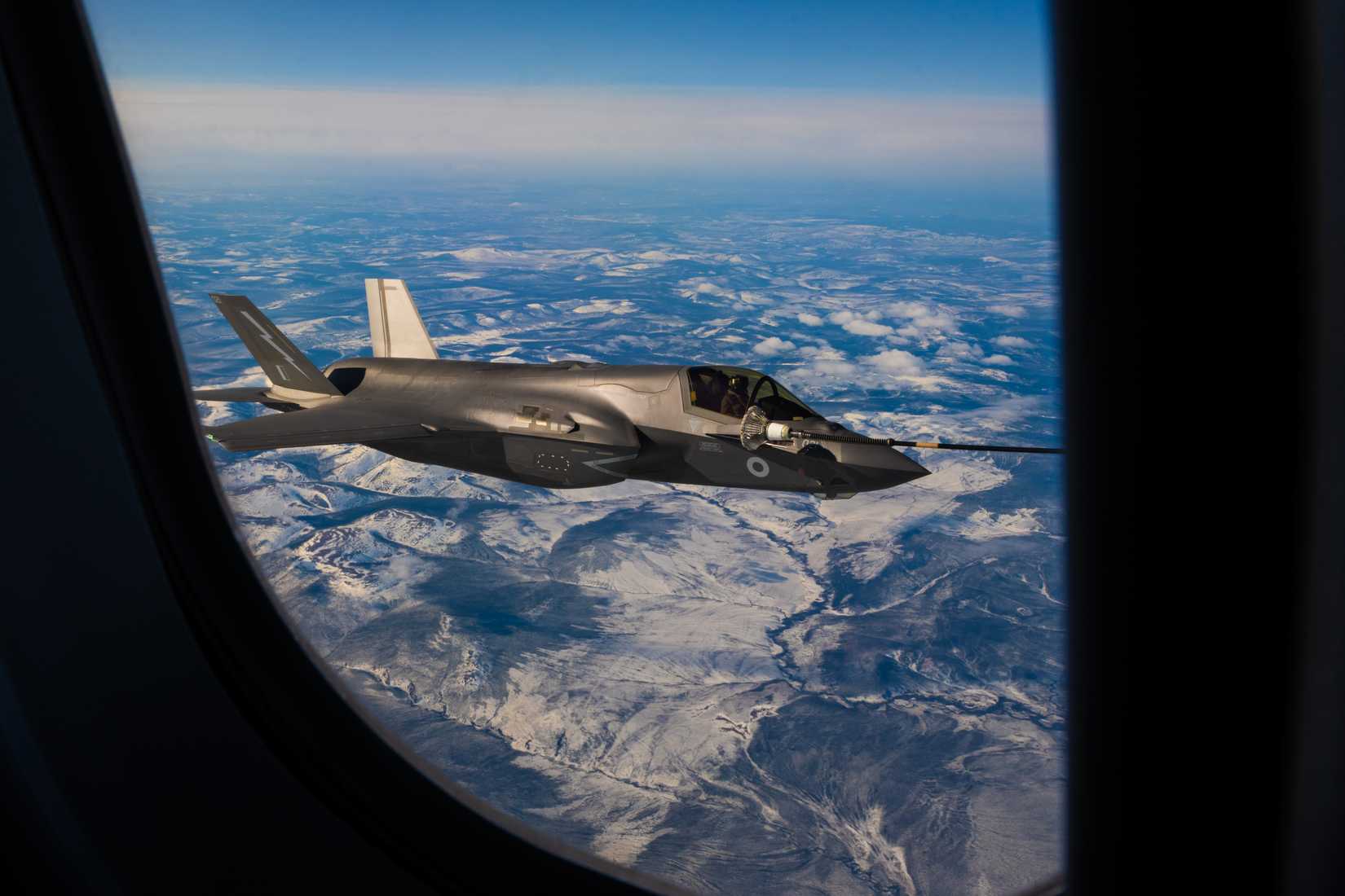 A Royal Air Force (RAF) F-35B Lightning assigned to No. 617 Squadron, receives fuel from a RAF KC-30 Voyager