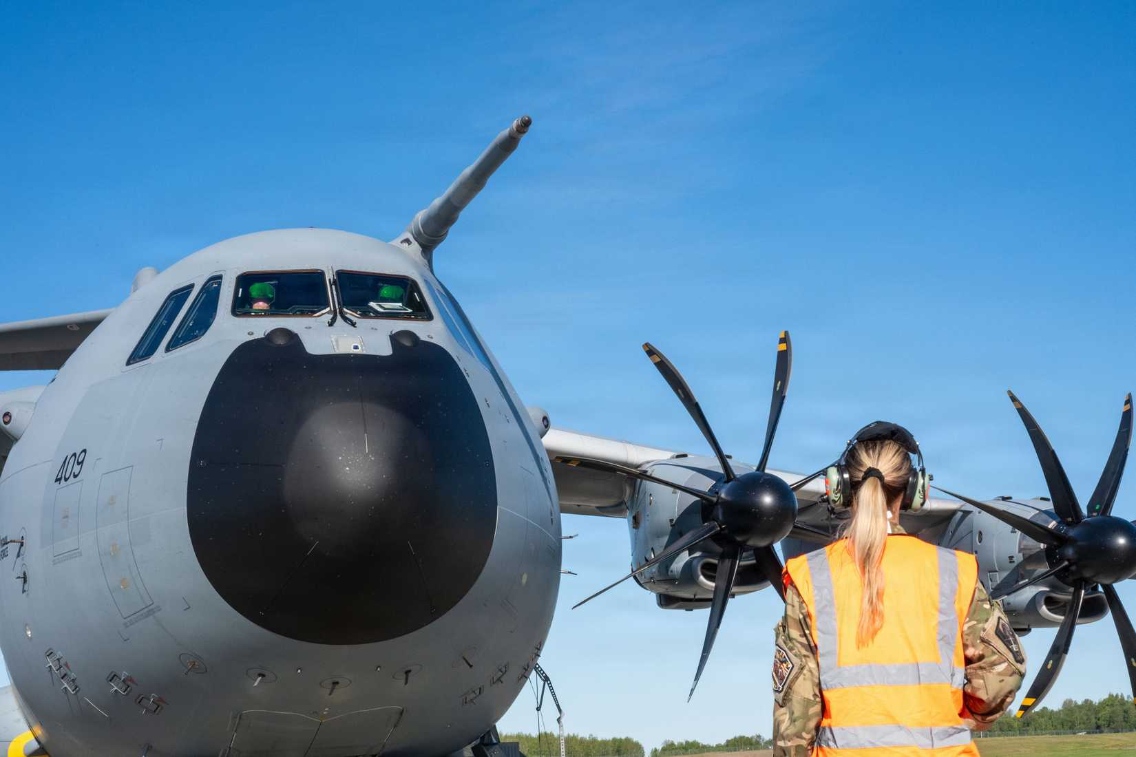 A Royal Air Force service member conducts pre-flight procedures with an Airbus A400M Atlas aircraft assigned to No. 70 Squadron on the flight line at Joint Base Elmendorf-Richardson, Alaska, June 3, 2026