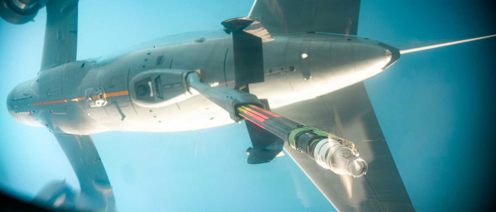 Air Force Airmen aboard a C-17 Globemaster III aircraft conduct an aerial refueling with a U.S. Air Force KC-46 Pegasus