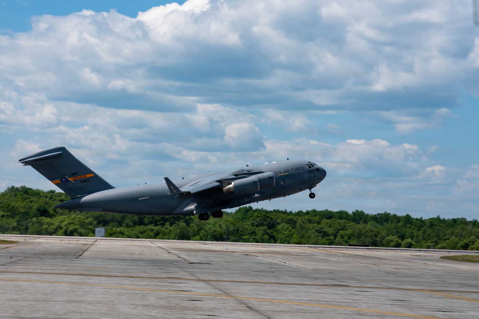 Air Force C-17 Globemaster assigned to the East Coast Demonstration Team takes off the Great State of Maine Air Show in Brunswick