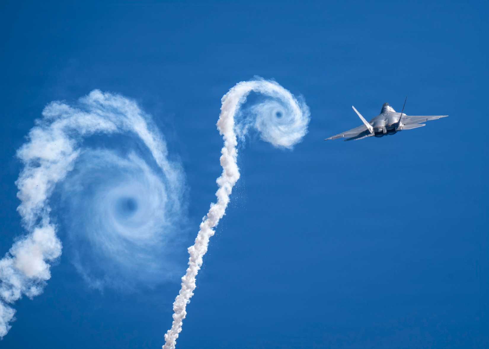 Air Force F-22 Raptor releases a salvo of flares