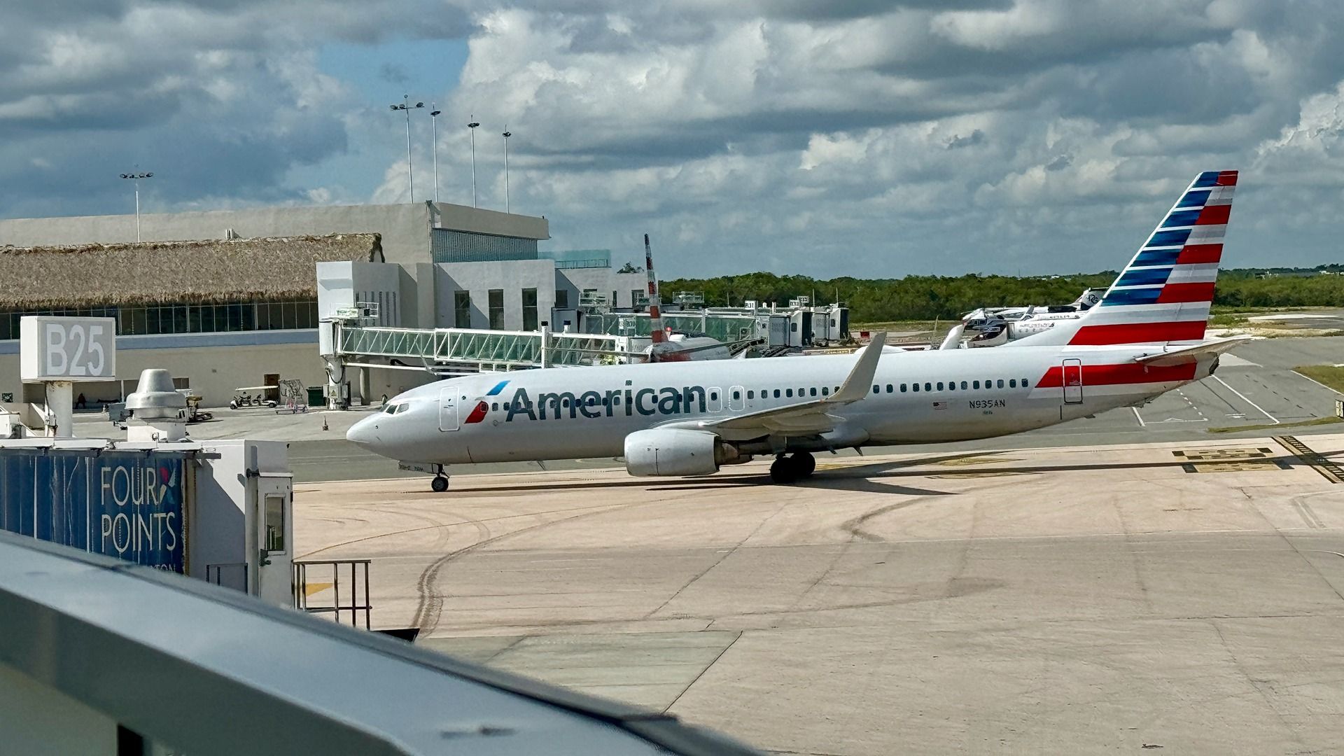 American Airlines Cancels Flight Minutes After Pushback Due To Suspected Engine Backfire