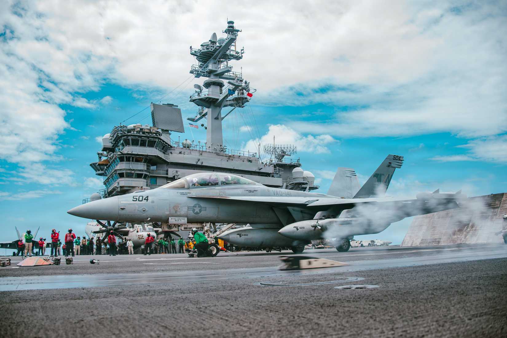 An EA-18G Growler, attached to Electronic Attack Squadron (VAQ) 141, prepares to launch from the flight deck of Nimitz-class aircraft carrier USS George Washington (CVN 73) 