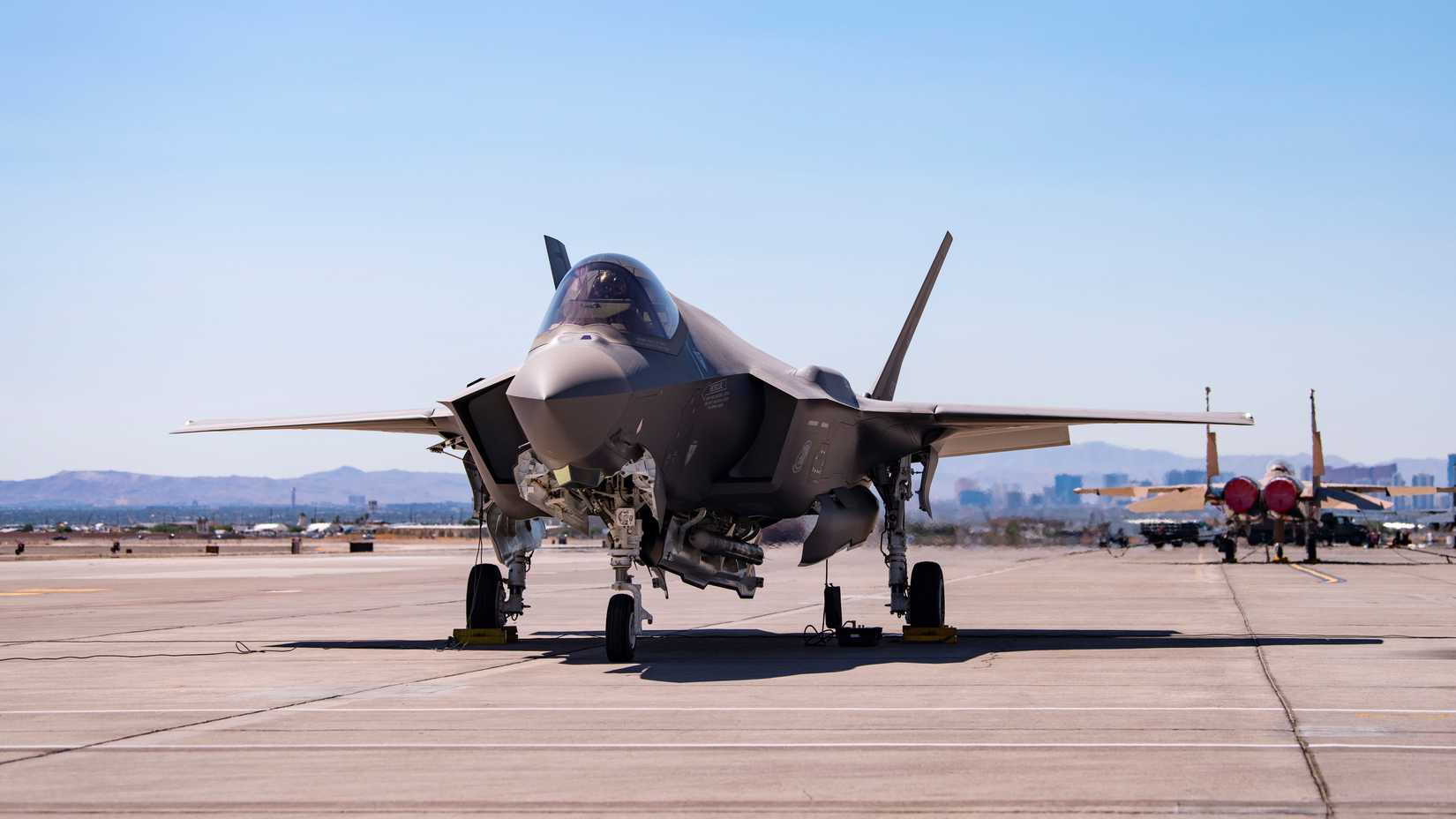 An F-35A Lighting II from Hill Air Force Base, Utah, carrying a B61-12 Joint Test Assembly sits on the flight line at Nellis Air Force Base
