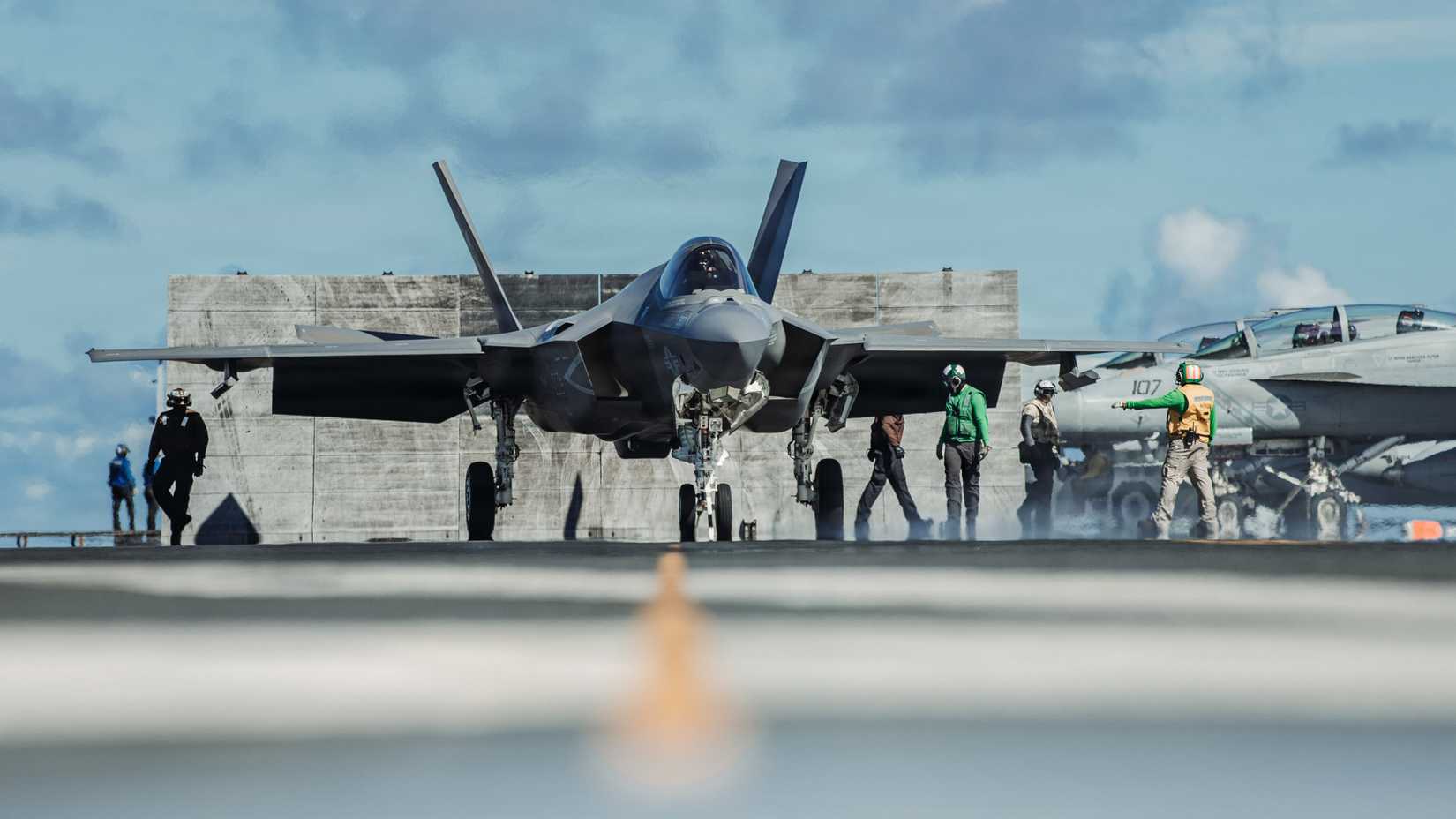 An F-35C Lightning II, attached to Strike Fighter Squadron (VFA) 147, readies for takeoff on the flight deck of Nimitz-class aircraft carrier USS George Washington (CVN 73)