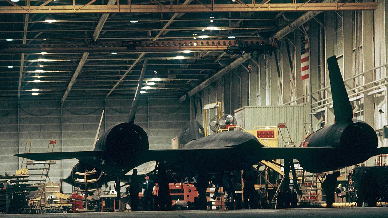 An SR-71 aircraft stands in the hangar at Lockheed Corporation headquarters prior to its recordbreaking, coast-to-coast flight.